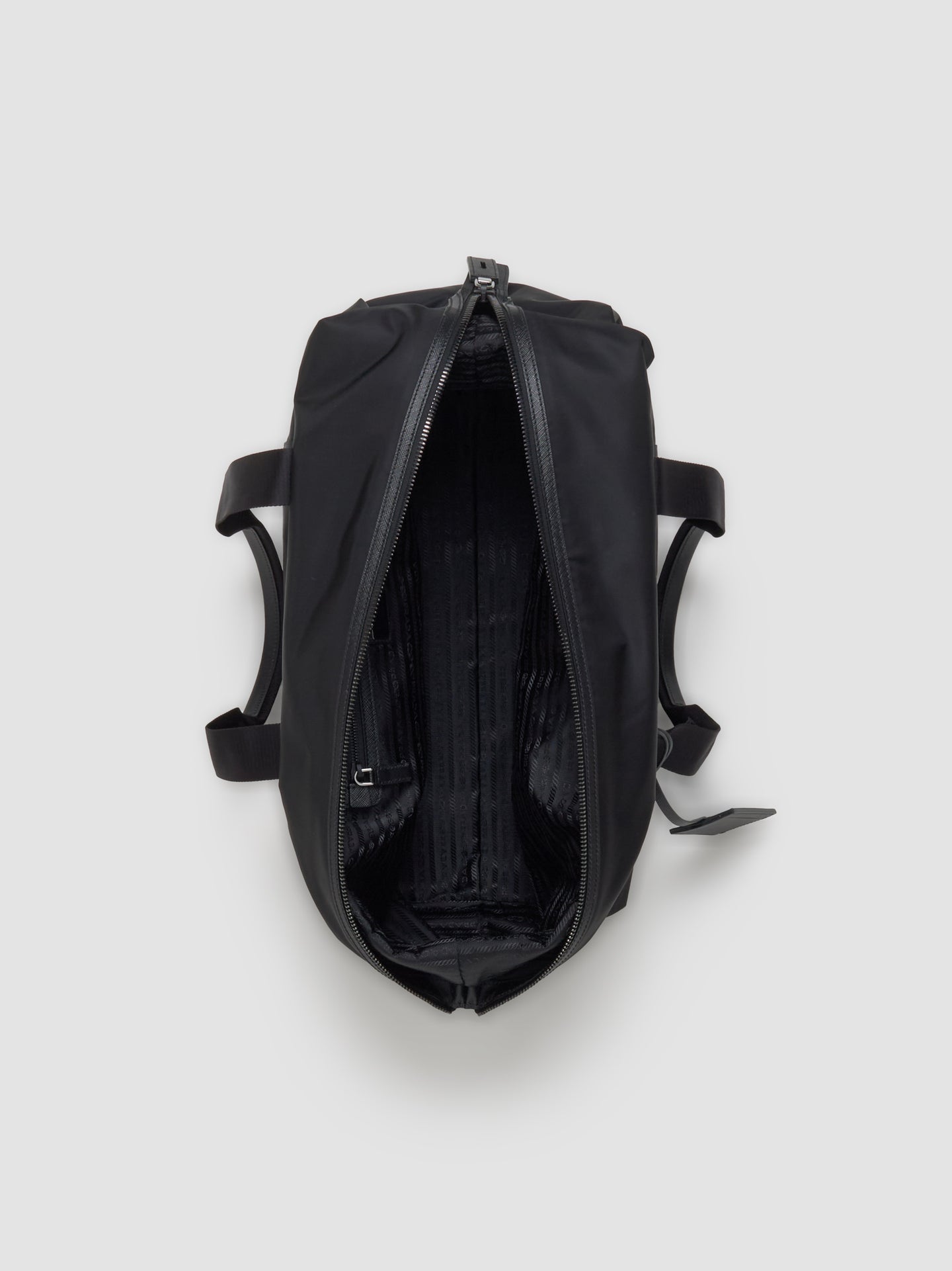 Re-Nylon and Saffiano Leather Travel Bag in Black