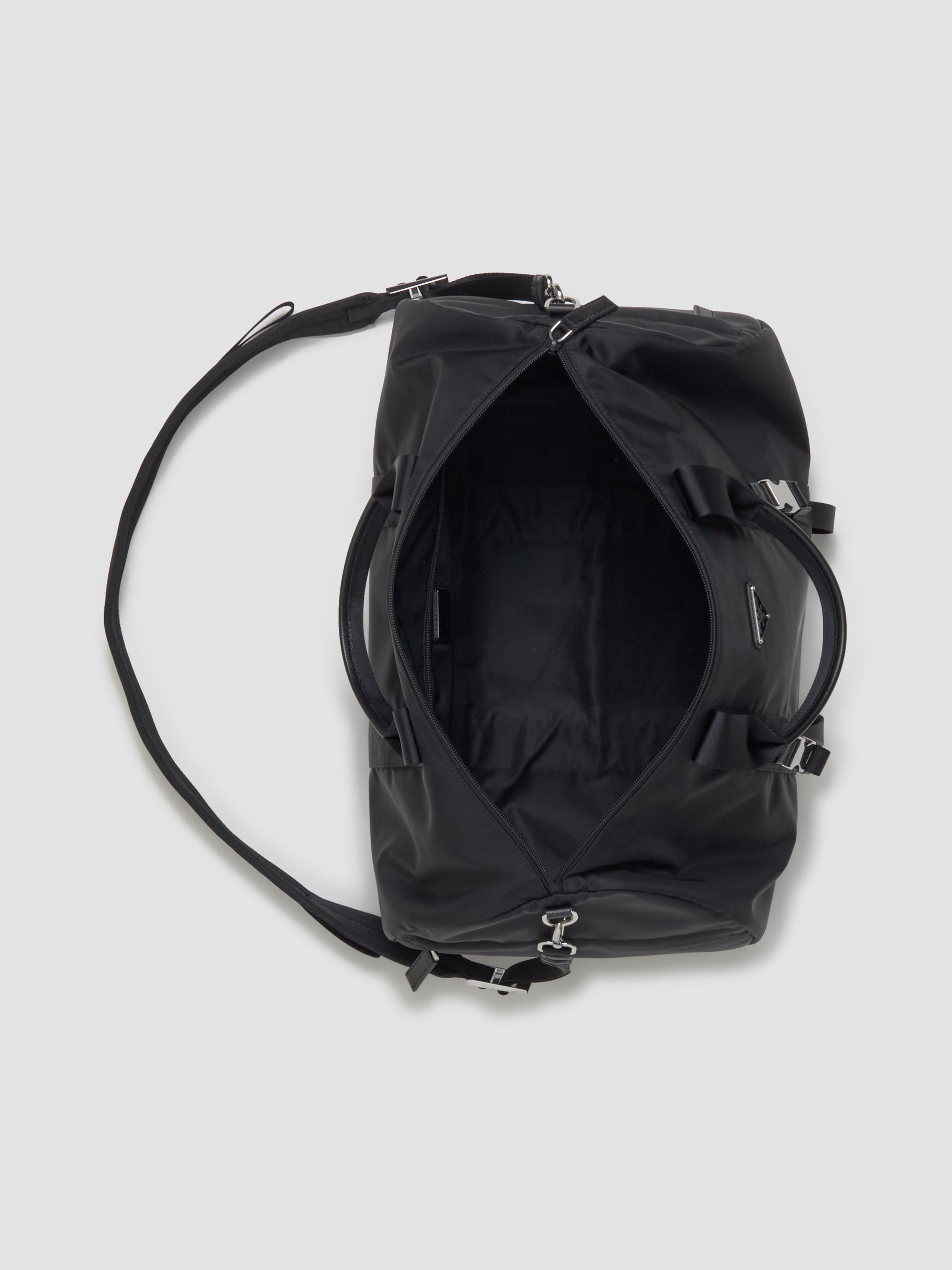 Re-Nylon and Saffiano Leather Duffle Bag in Black