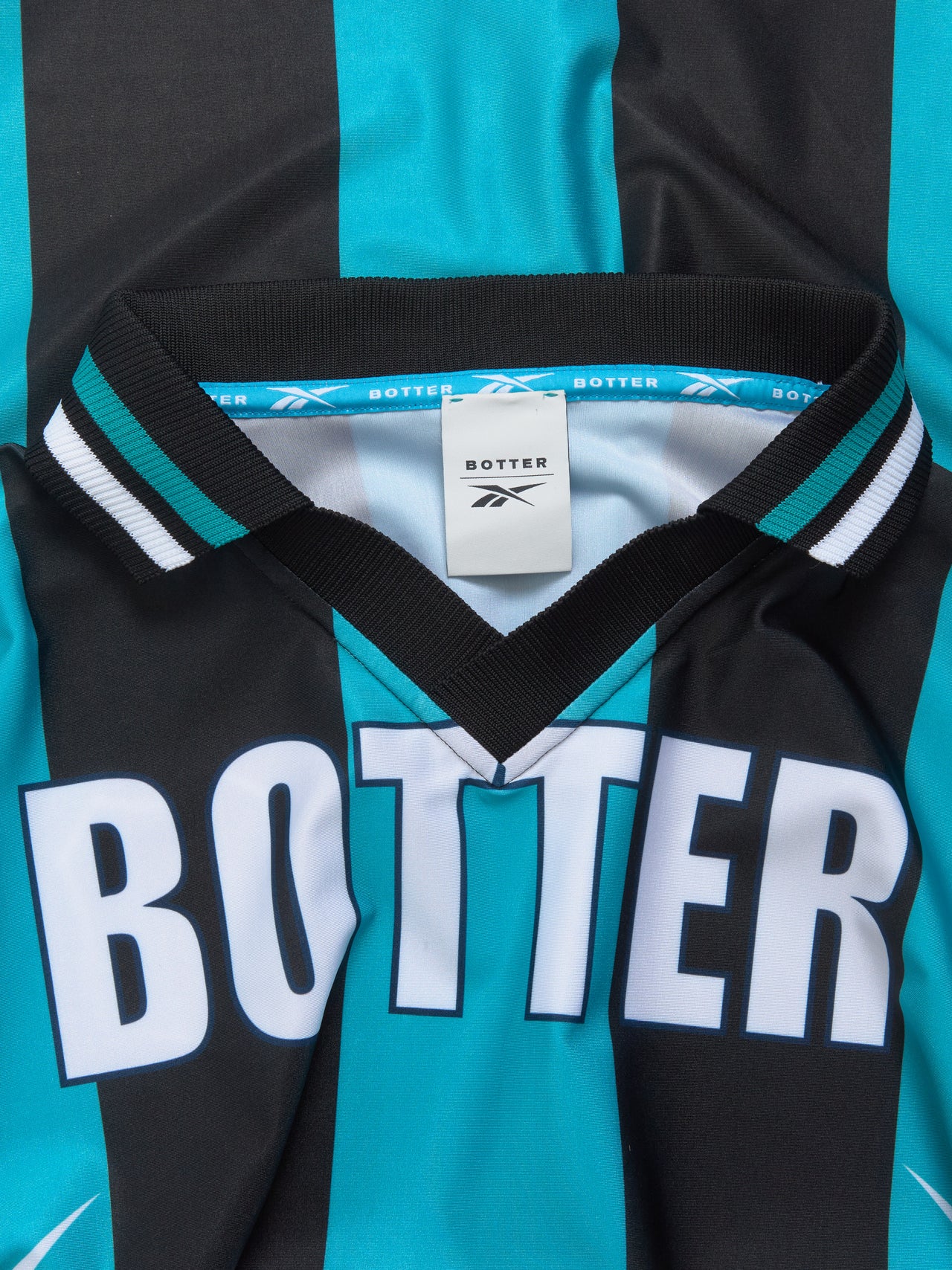 x Botter Reverse Soccer T-Shirt in Striped Navy & Aqua Blue