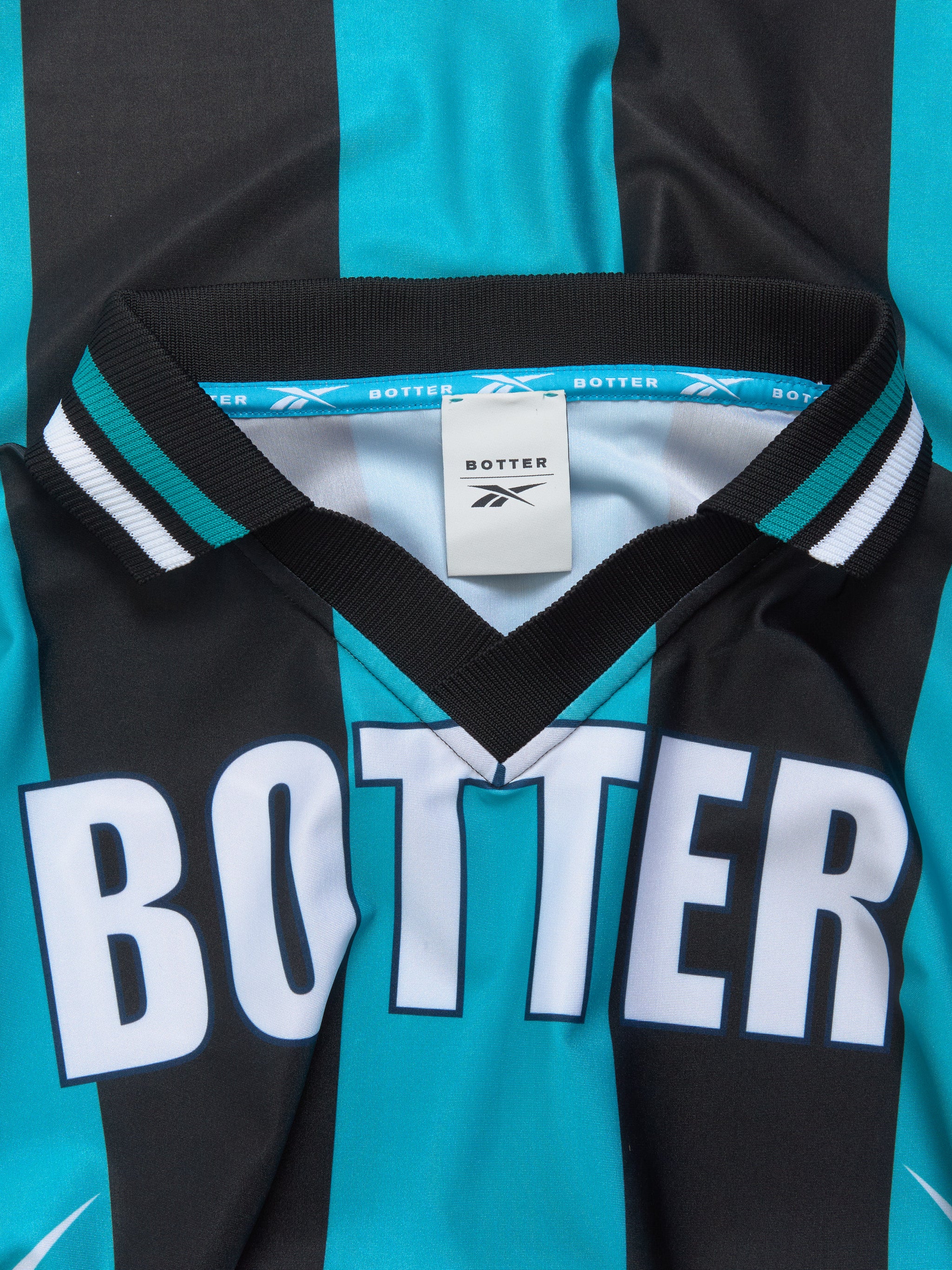 x Botter Reverse Soccer T-Shirt in Striped Navy & Aqua Blue