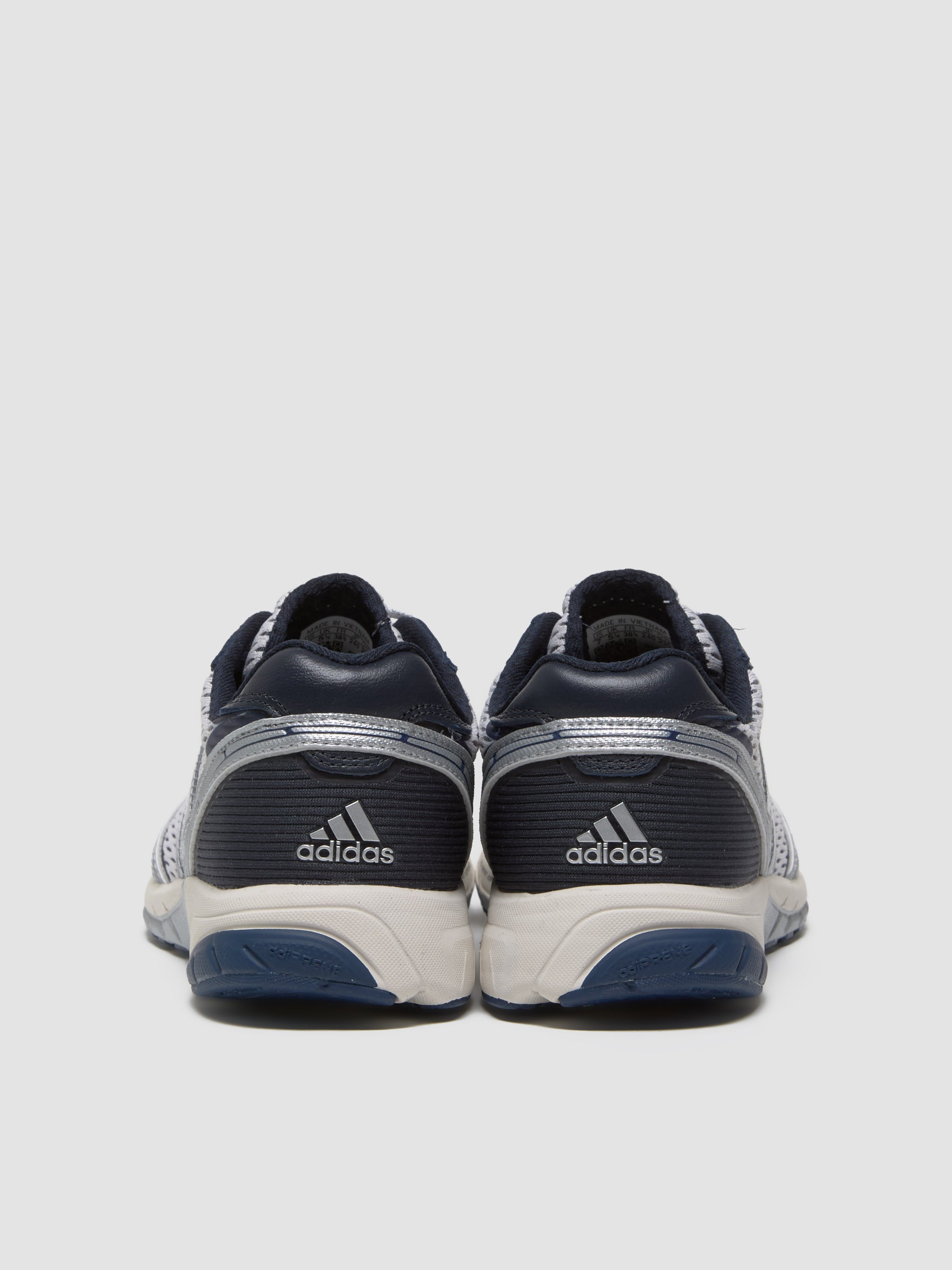 x Sporty & Rich WMNS Adizero Adios Sneaker in White & Core Navy