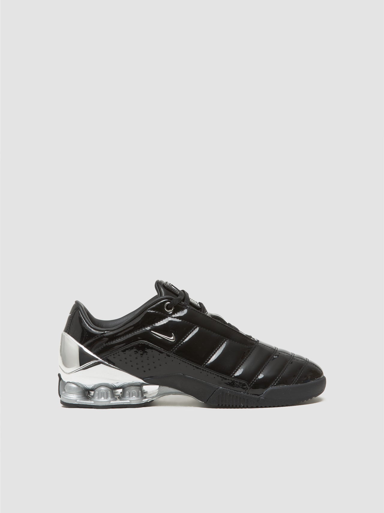 x Maha Amsterdam WMNS T90 Shox Magia SP Sneaker in Black & Metallic Silver