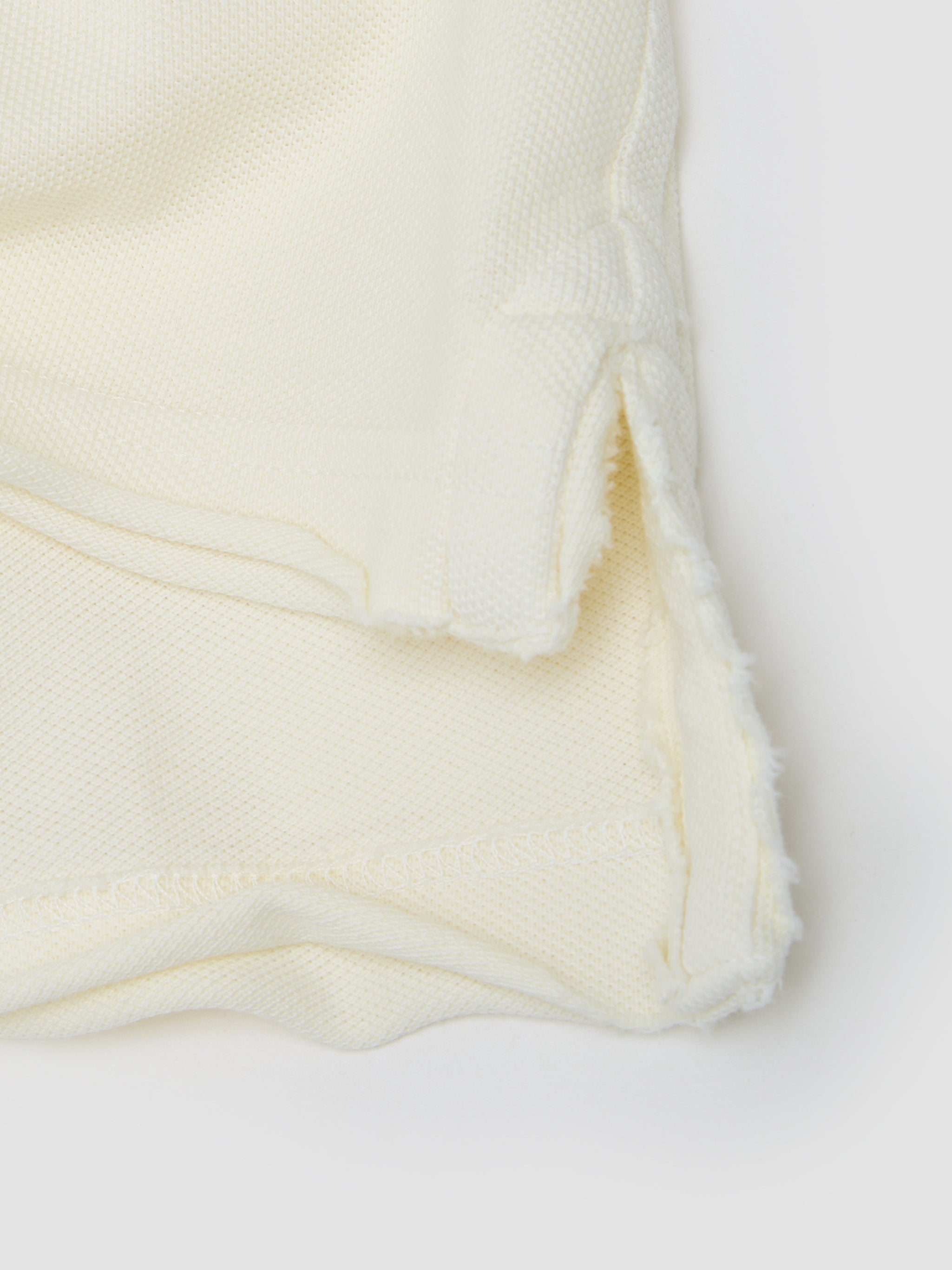 Script Polo Knitted T-Shirt in Dirty White