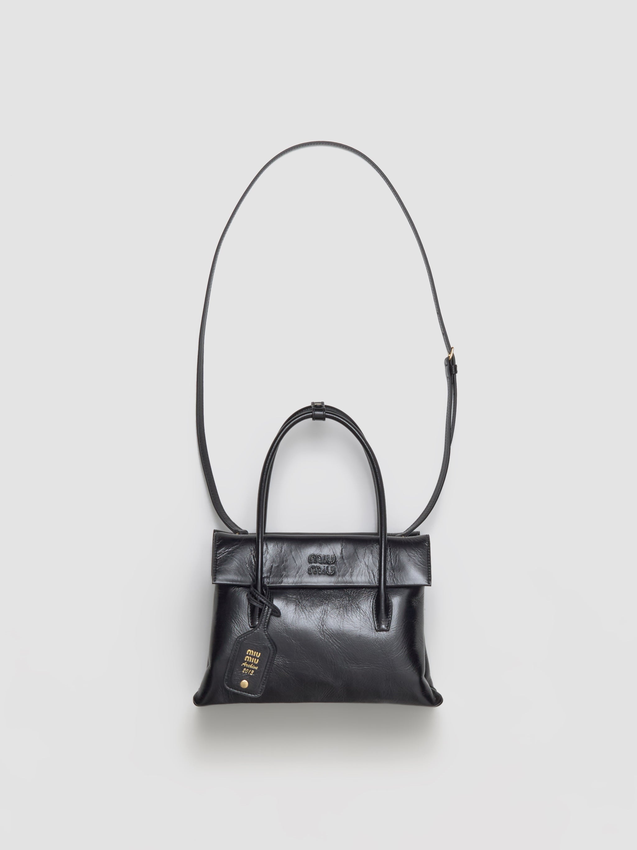 Solitaire Shiny Leather Case Bag in Black