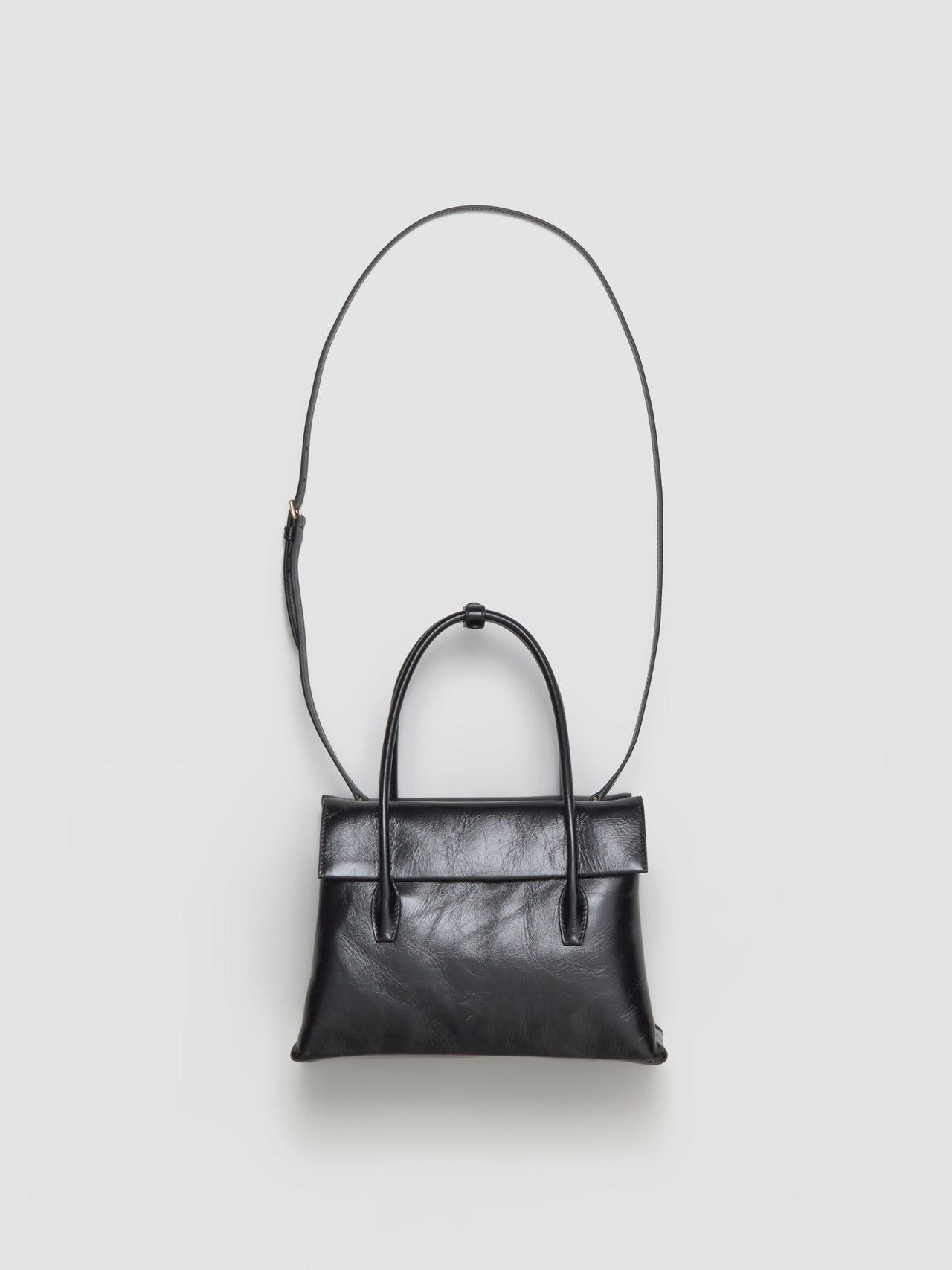 Solitaire Shiny Leather Case Bag in Black