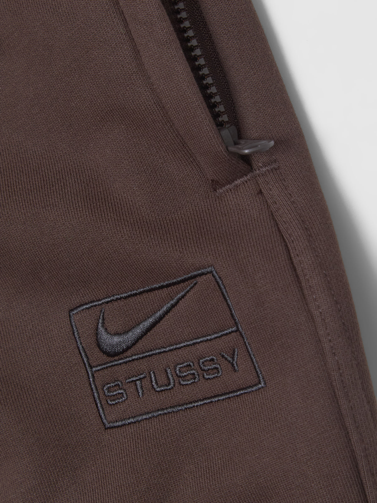x Stüssy Washed Fleece Pants in Dark Cinder