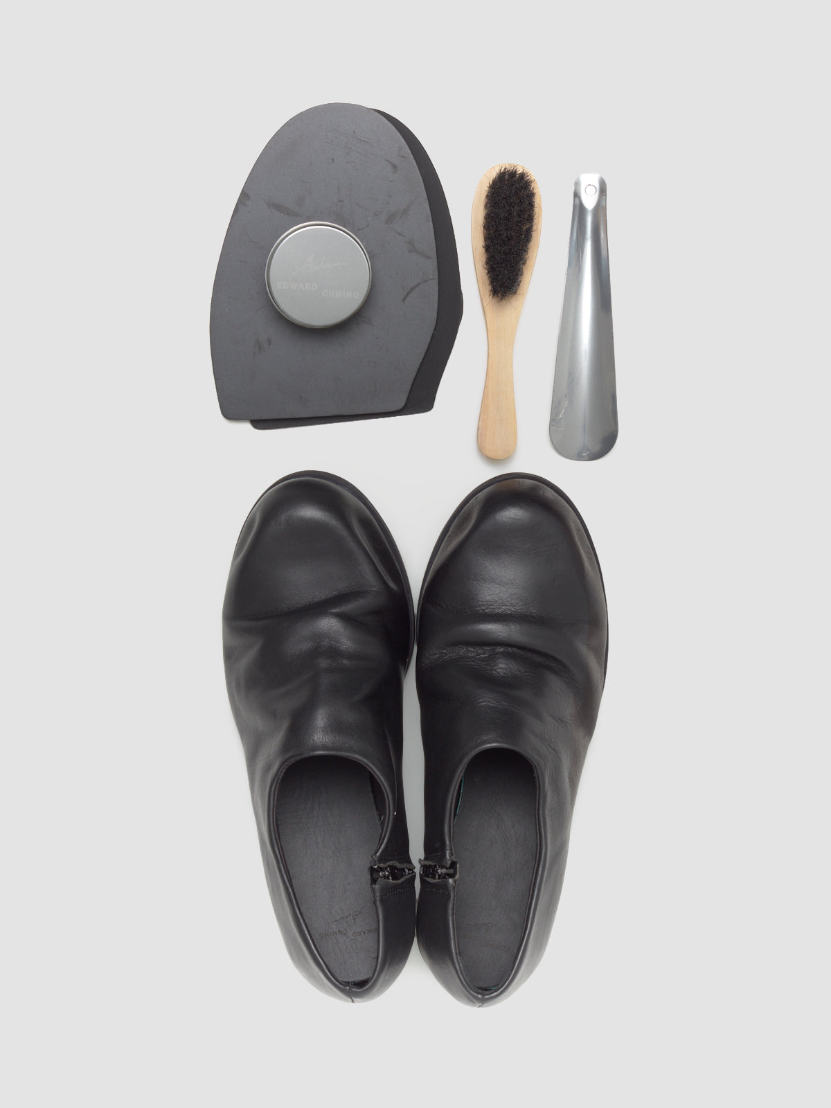 Bubble Toe Zip-On Shoes in Black