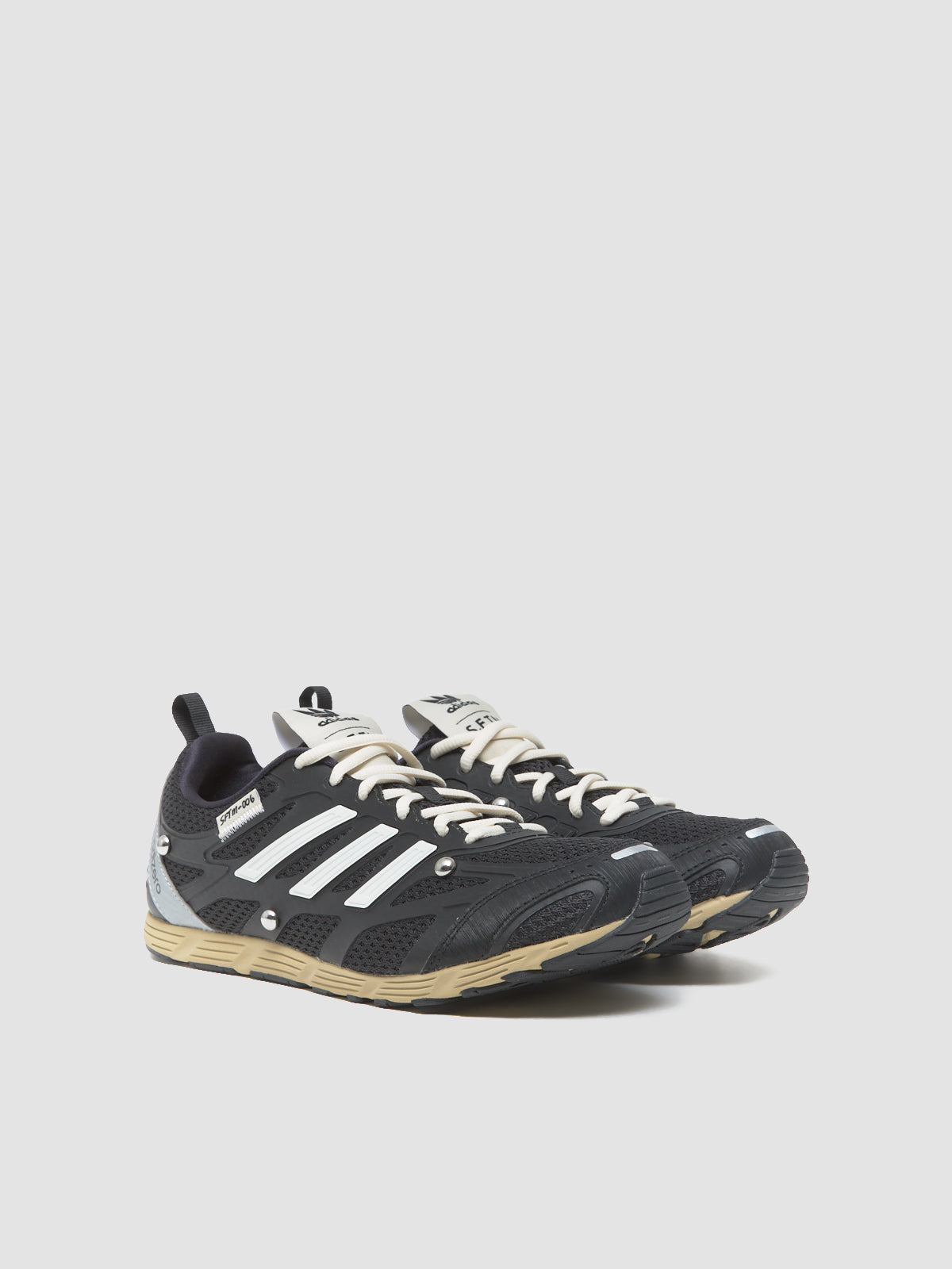 x SFTM Adizero PR Sneaker in Core Black & Cream White