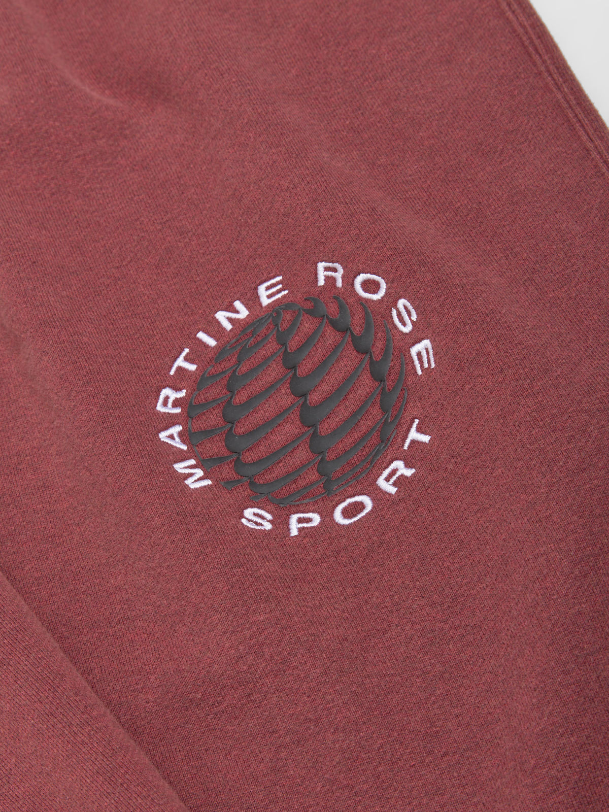 x Martine Rose Globus Fleece Pants in Team Crimson & Heather