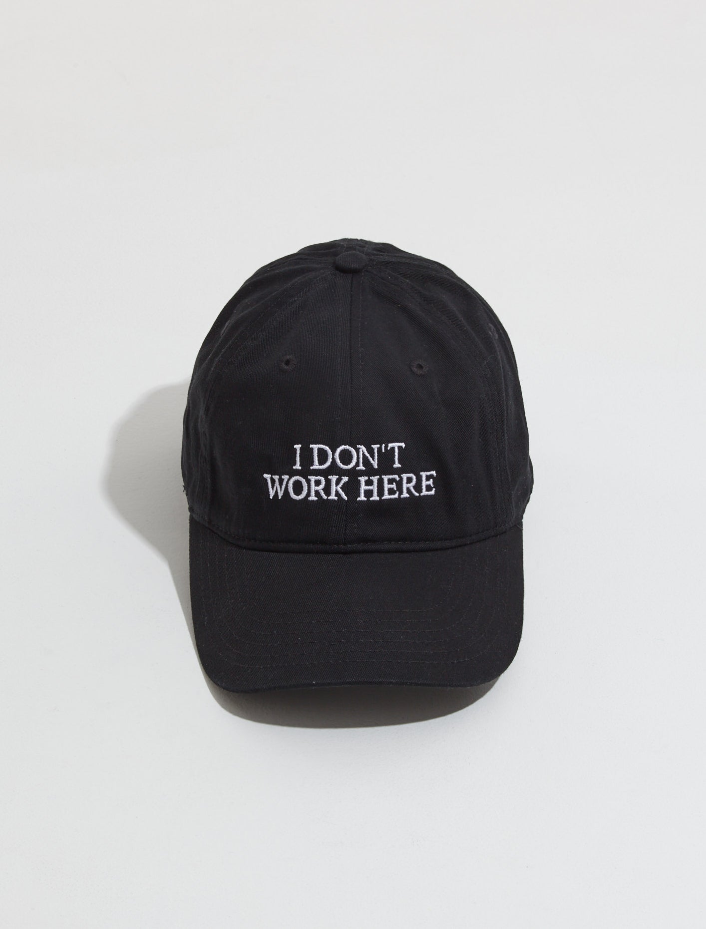 I Don't Work Here Cap in Black