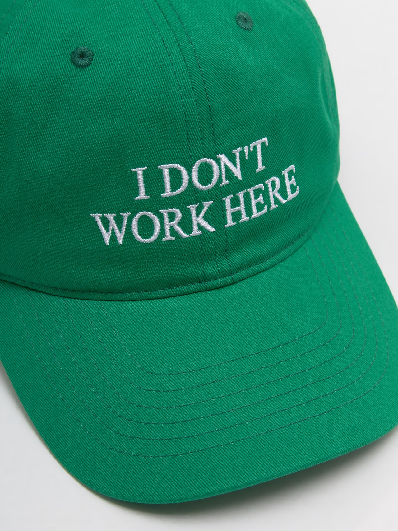 I Don't Work Here Cap in Green