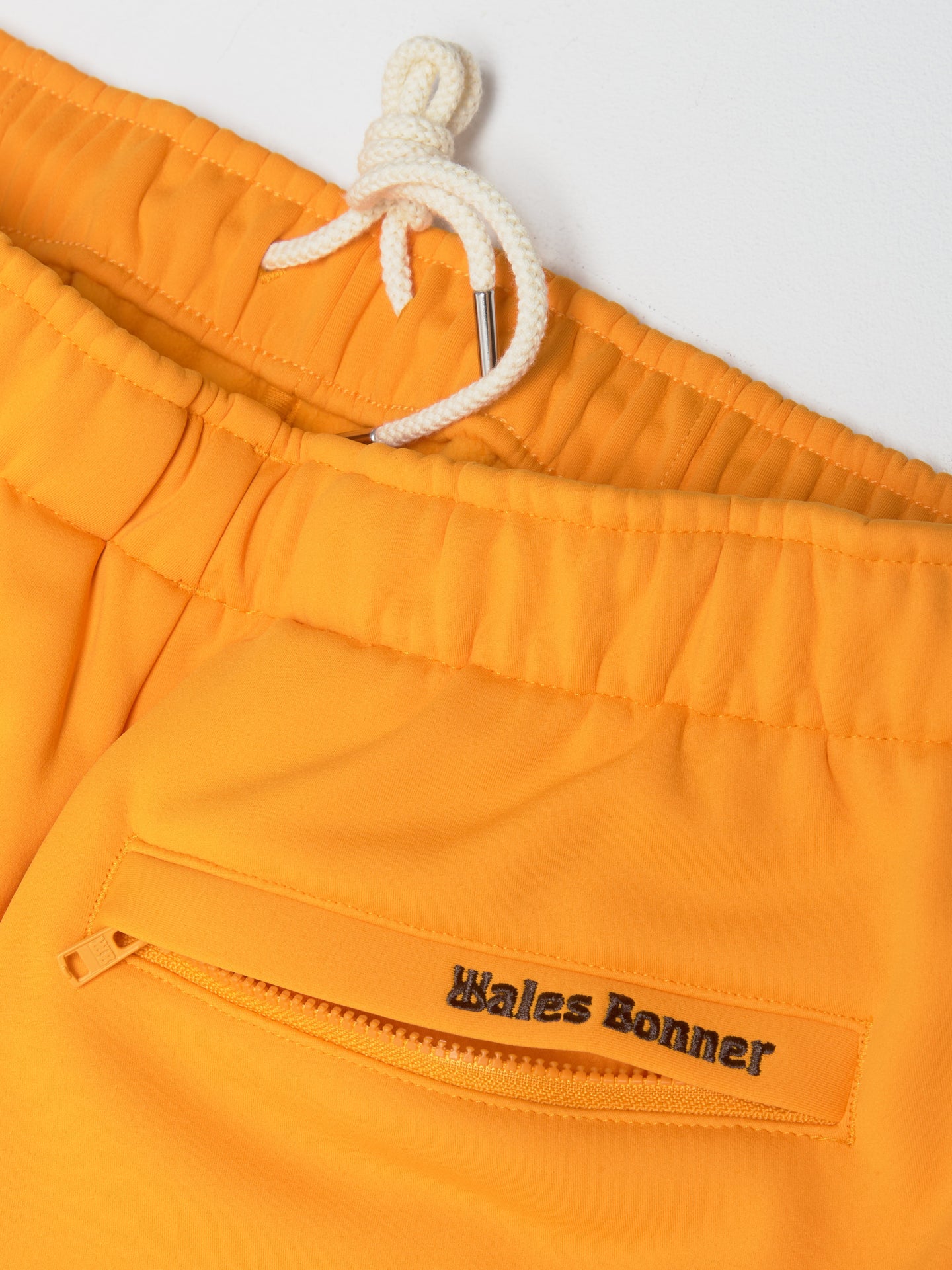 x Wales Bonner Track Pants in EQT Orange