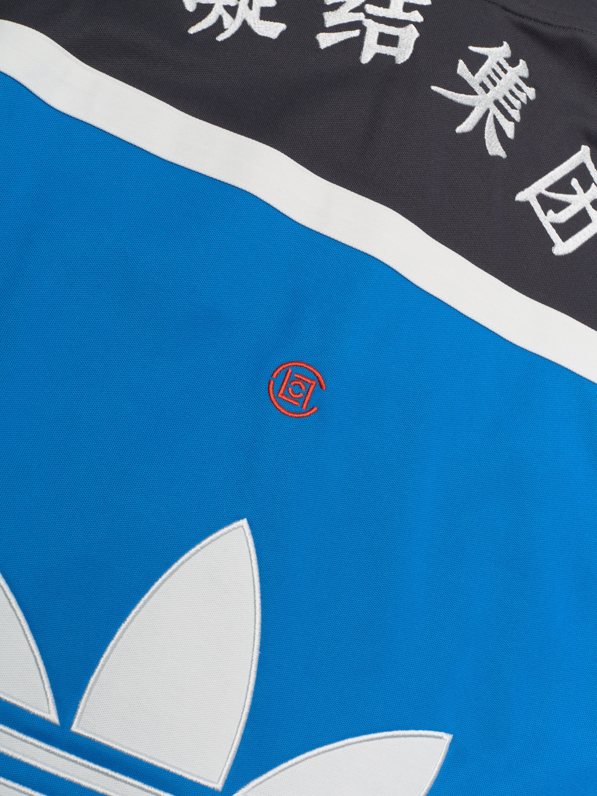 x CLOT Warmup Jacket in Bright Blue