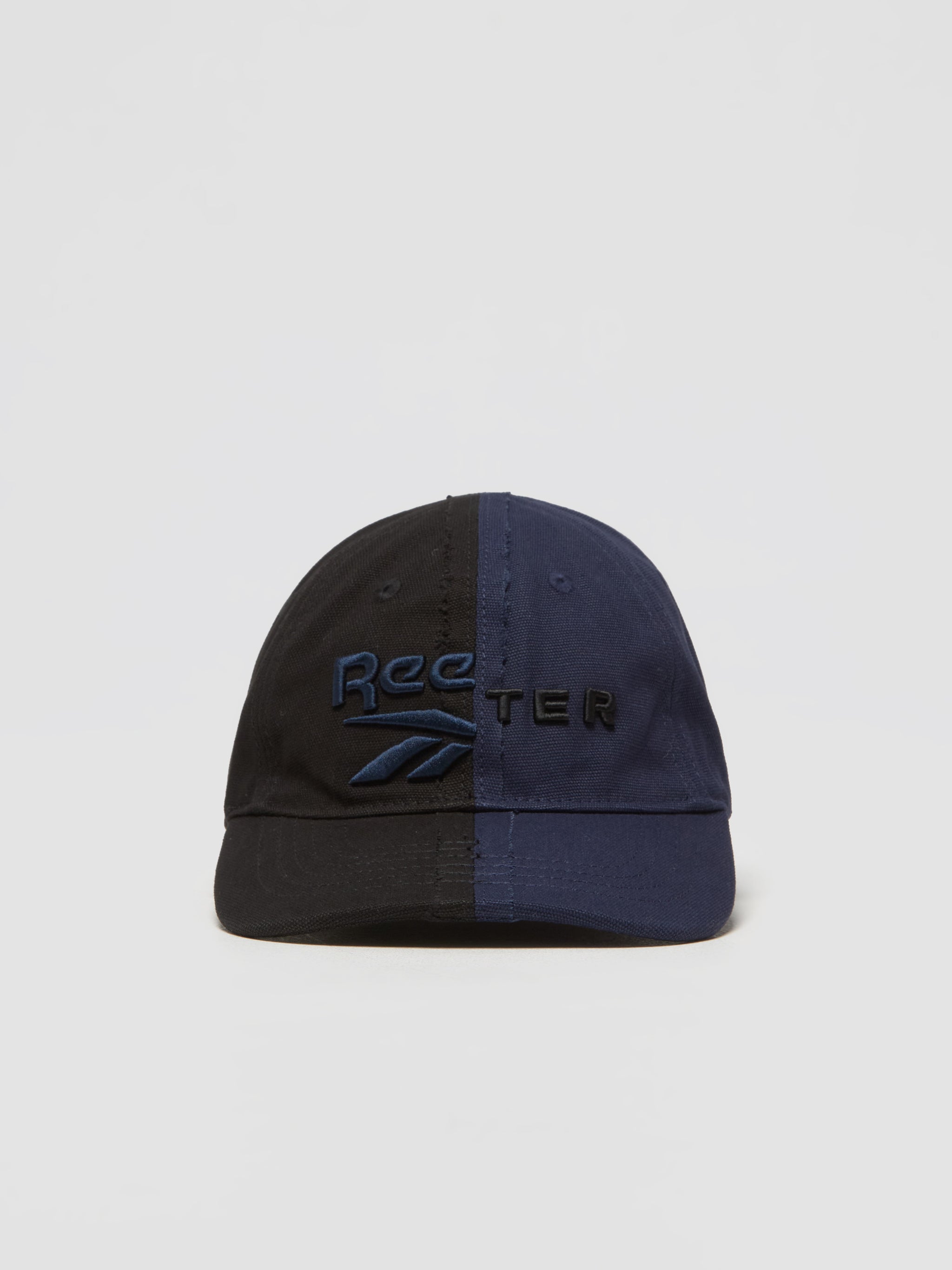 x Botter Paneled Cap in Black & Navy