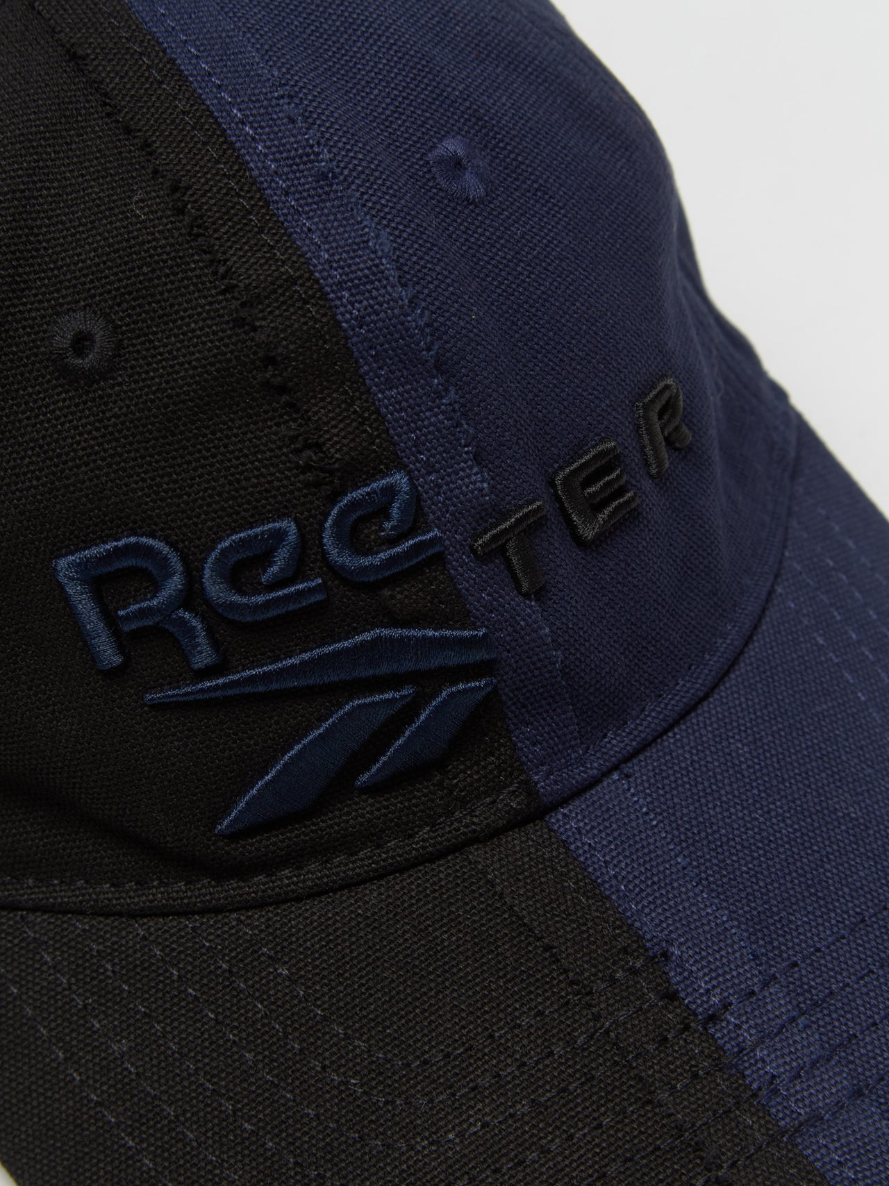 x Botter Paneled Cap in Black & Navy