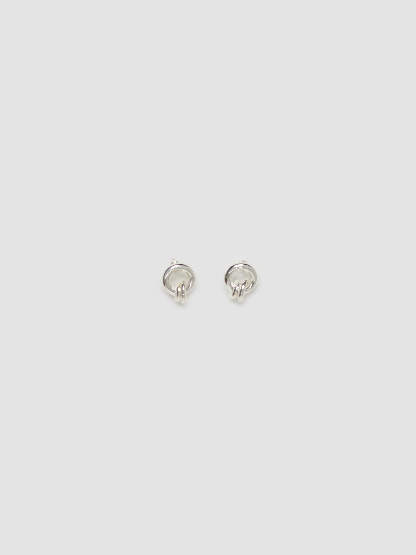 Muscle Earring in Silver