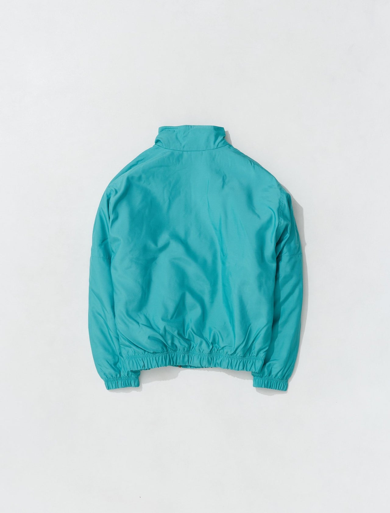 NRG Solo Swoosh Satin Bomber Jacket in Washed Teal