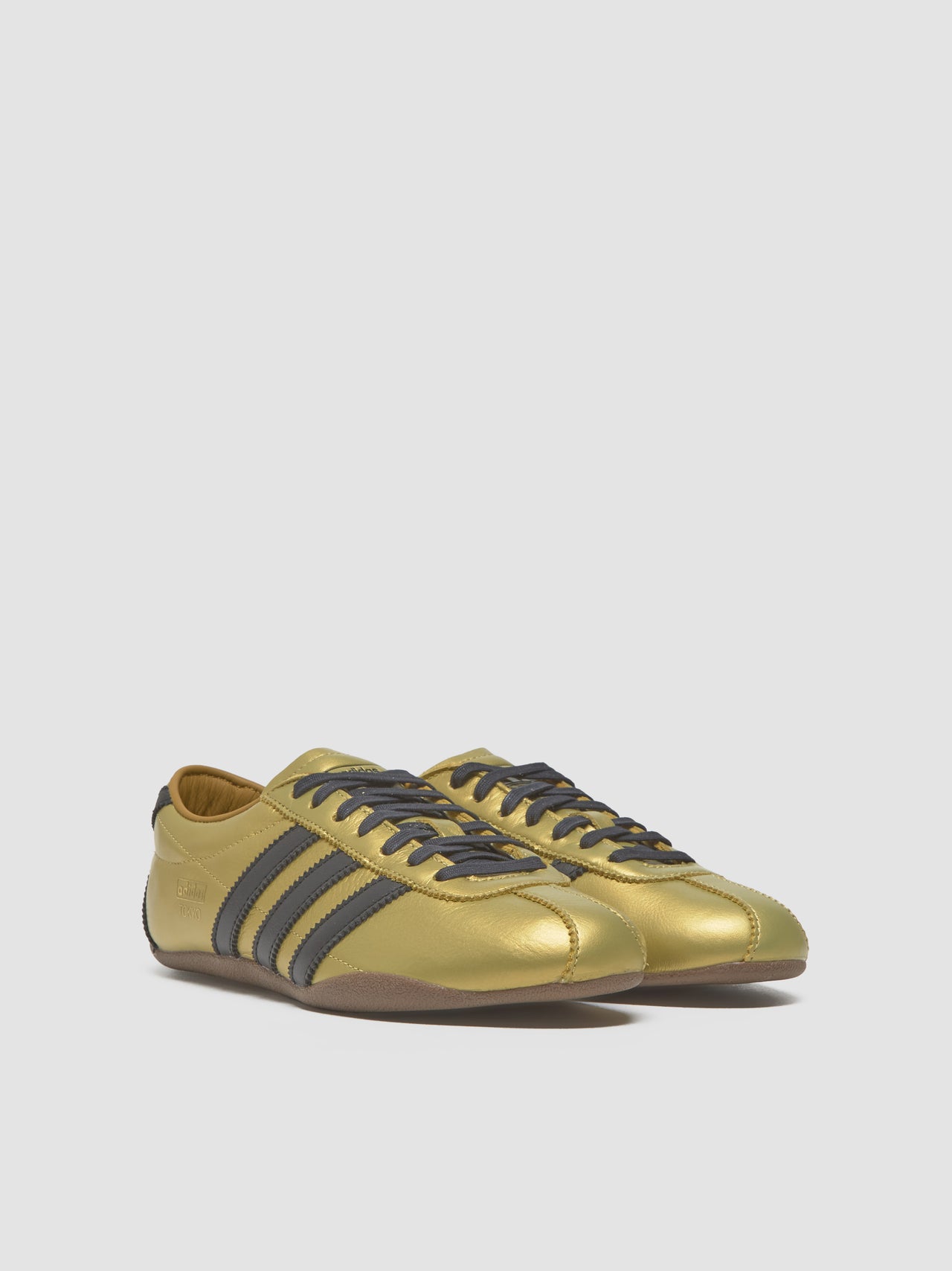 WMNS Tokyo Decon Sneaker in Gold Metallic & Core Black