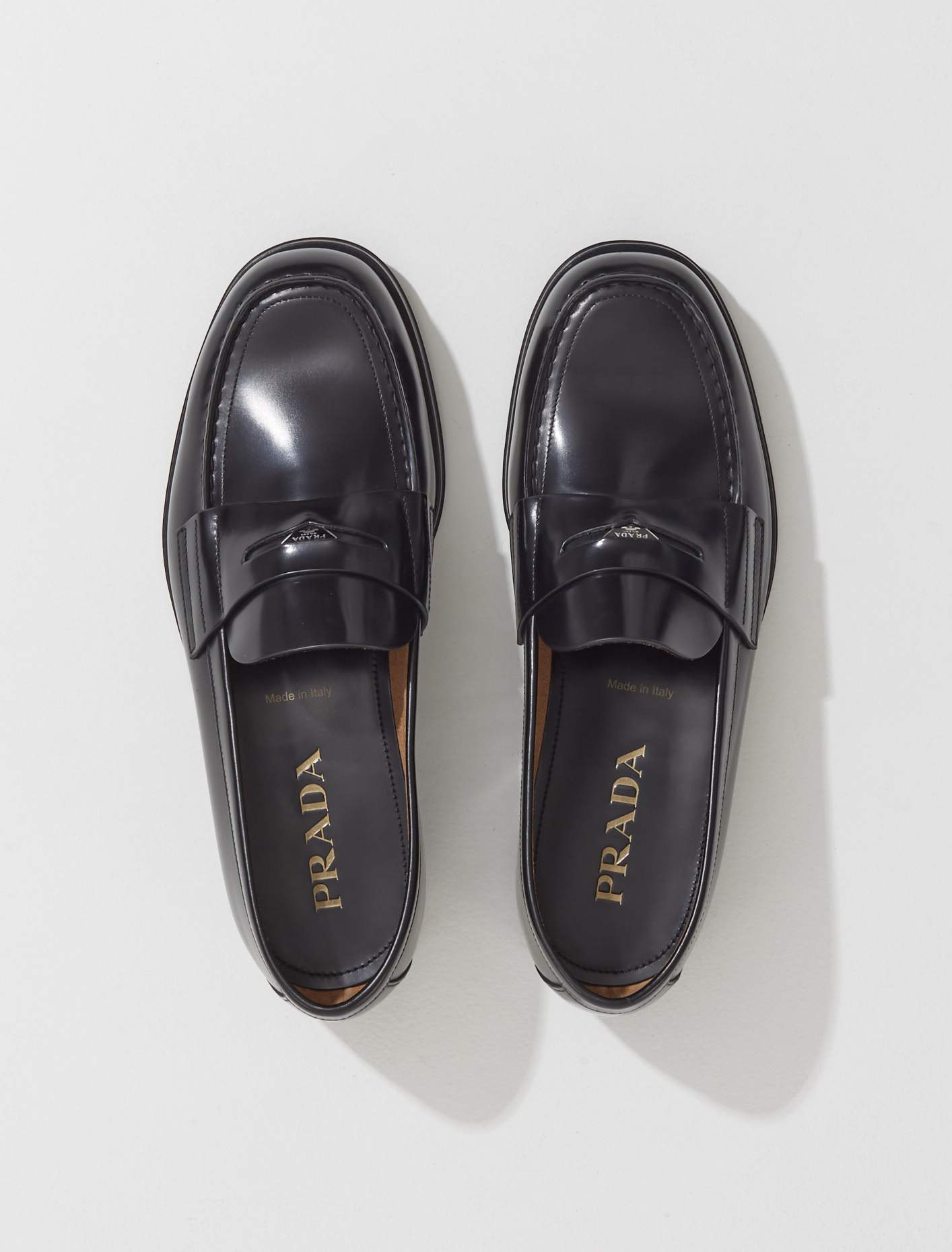 Prada Brushed Leather Mini Logo Loafers in Black
