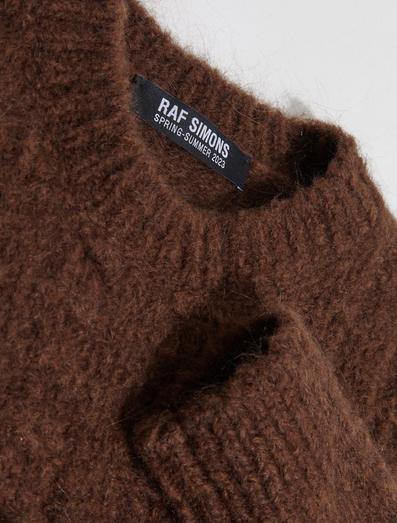 Small Fit Cable Knit Crewneck Sweater in Dark Brown