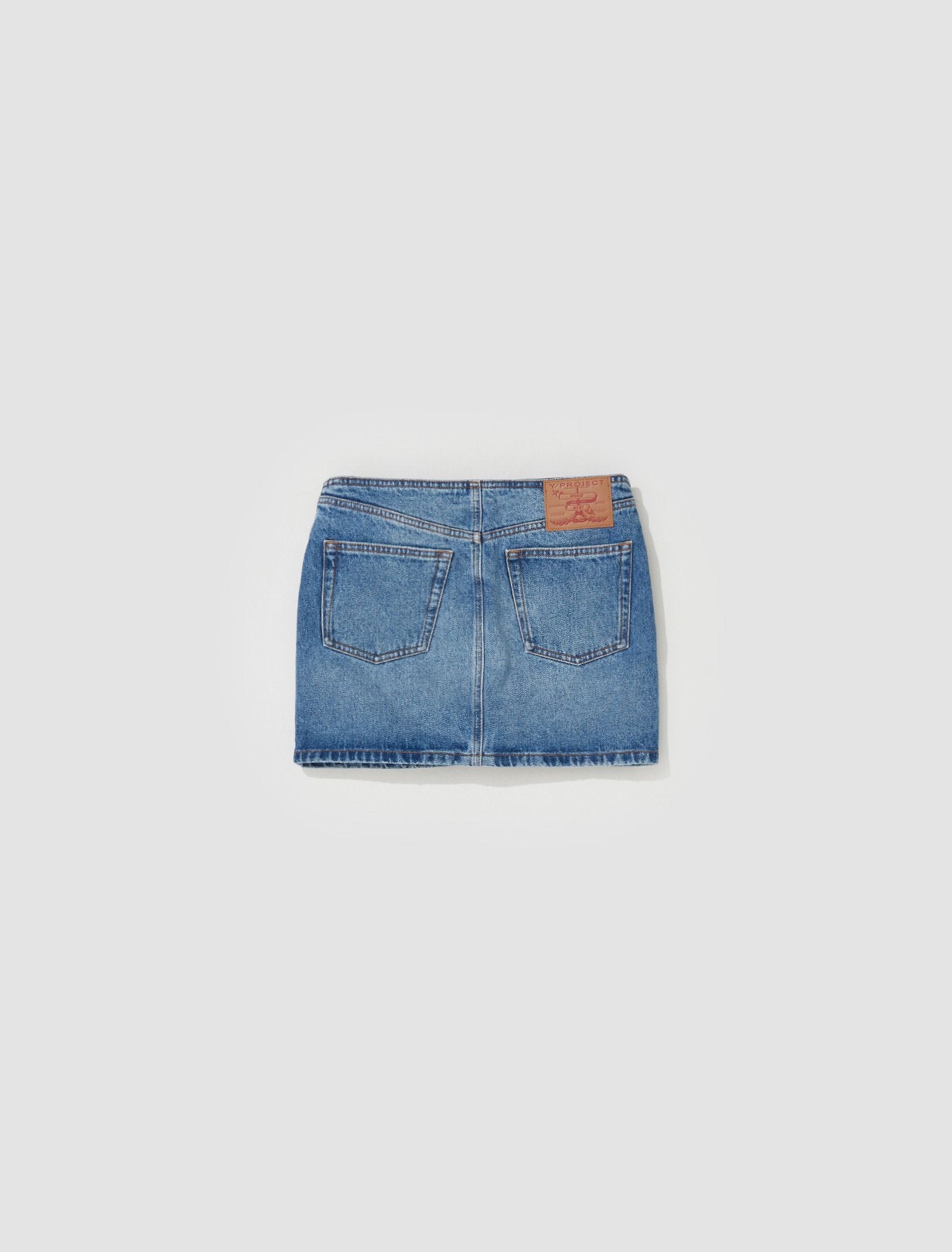 Y Belt Arc Denim Mini Skirt in Faded Blue