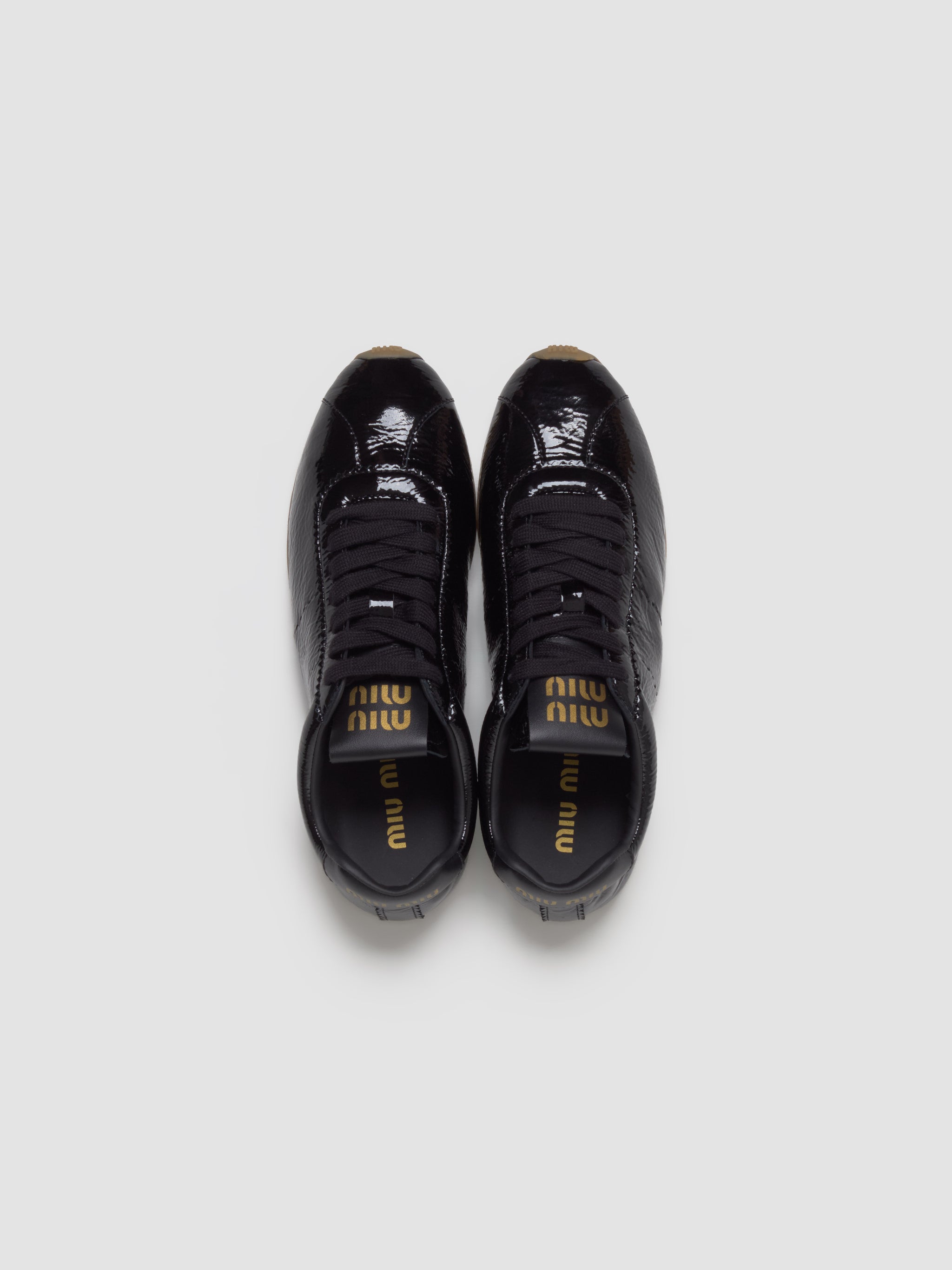 Naplak Leather Laced Up Sneaker in Black