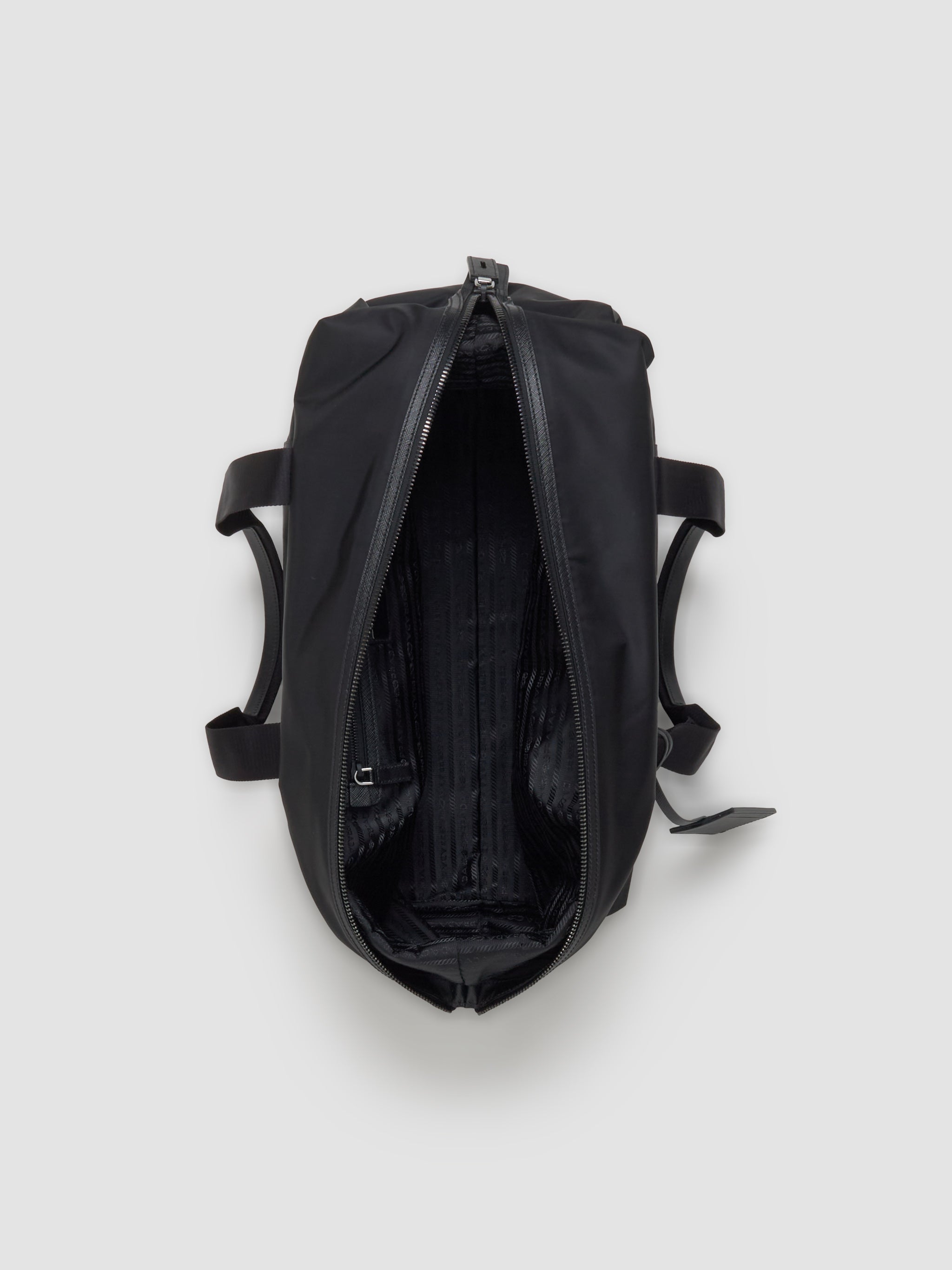 Re-Nylon and Saffiano Leather Travel Bag in Black