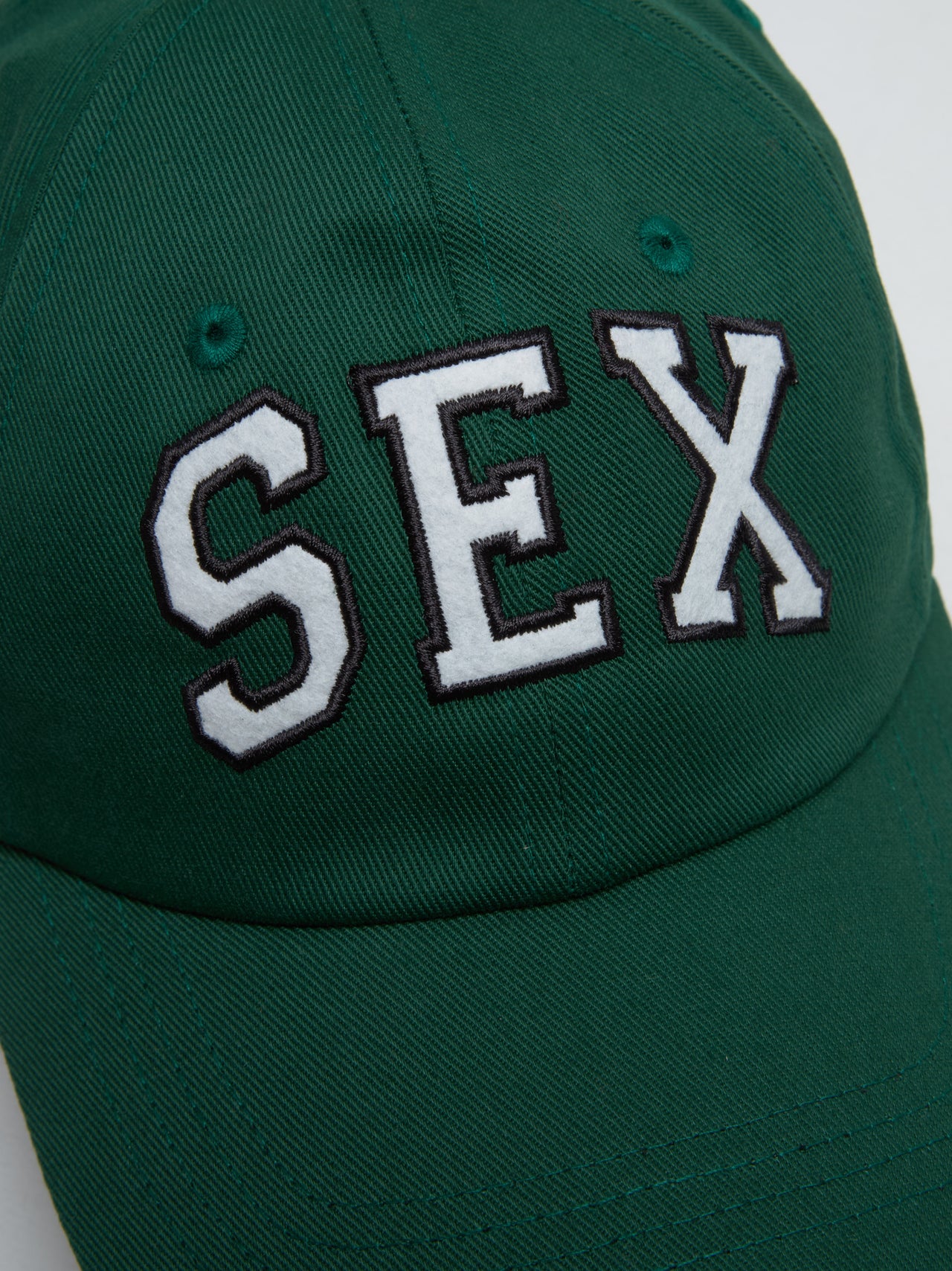 Sex Wins Cap in Green