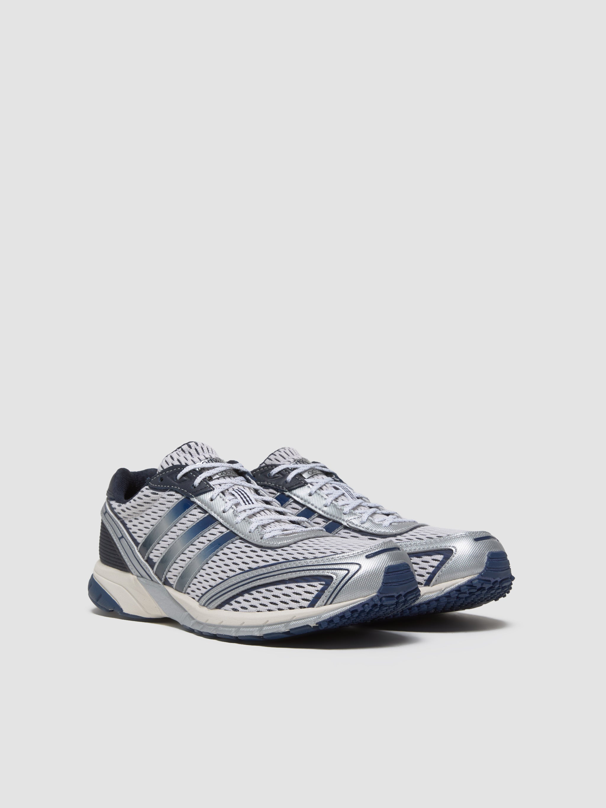 x Sporty & Rich WMNS Adizero Adios Sneaker in White & Core Navy