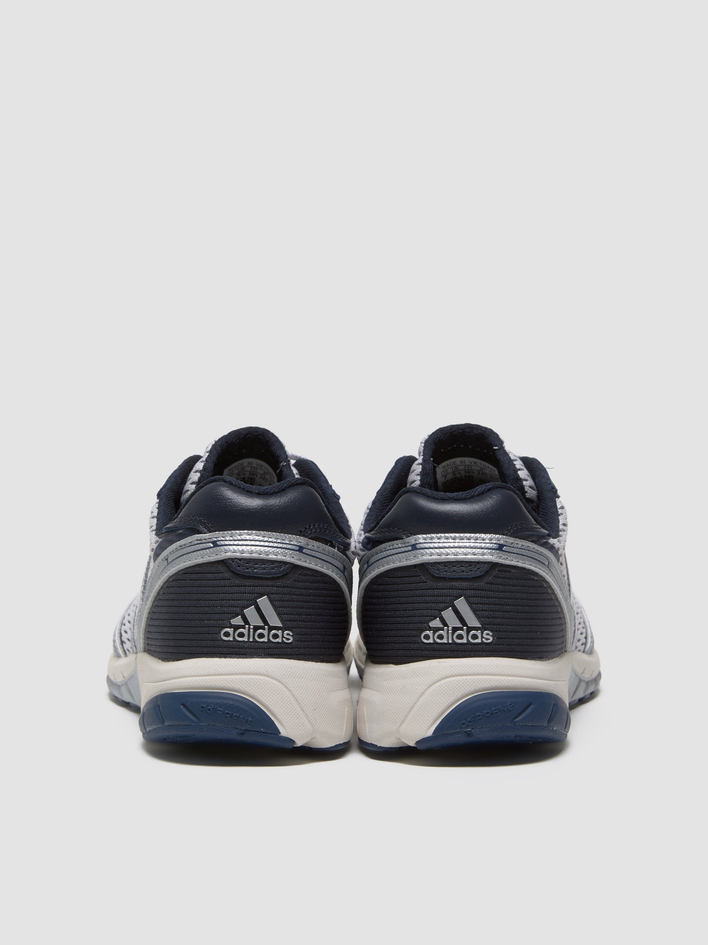 x Sporty & Rich WMNS Adizero Adios Sneaker in White & Core Navy