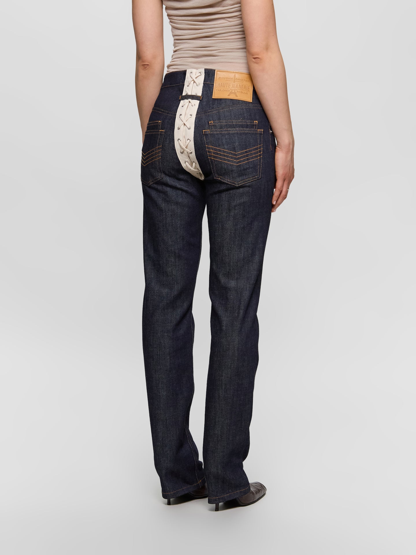 Contrasting Lace-Up Denim Jeans in Indigo