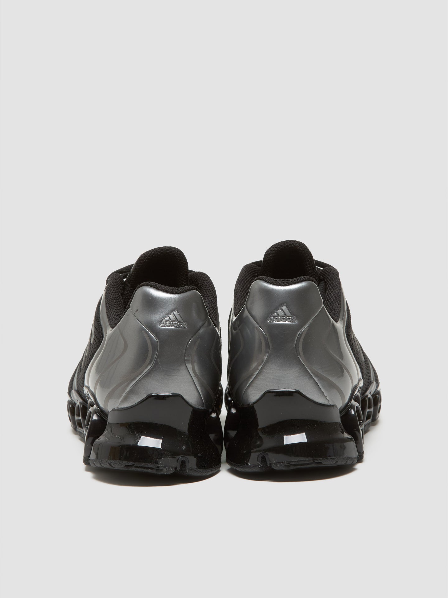 WMNS Mega Ghostride Sneaker in Black & Iron Metallic