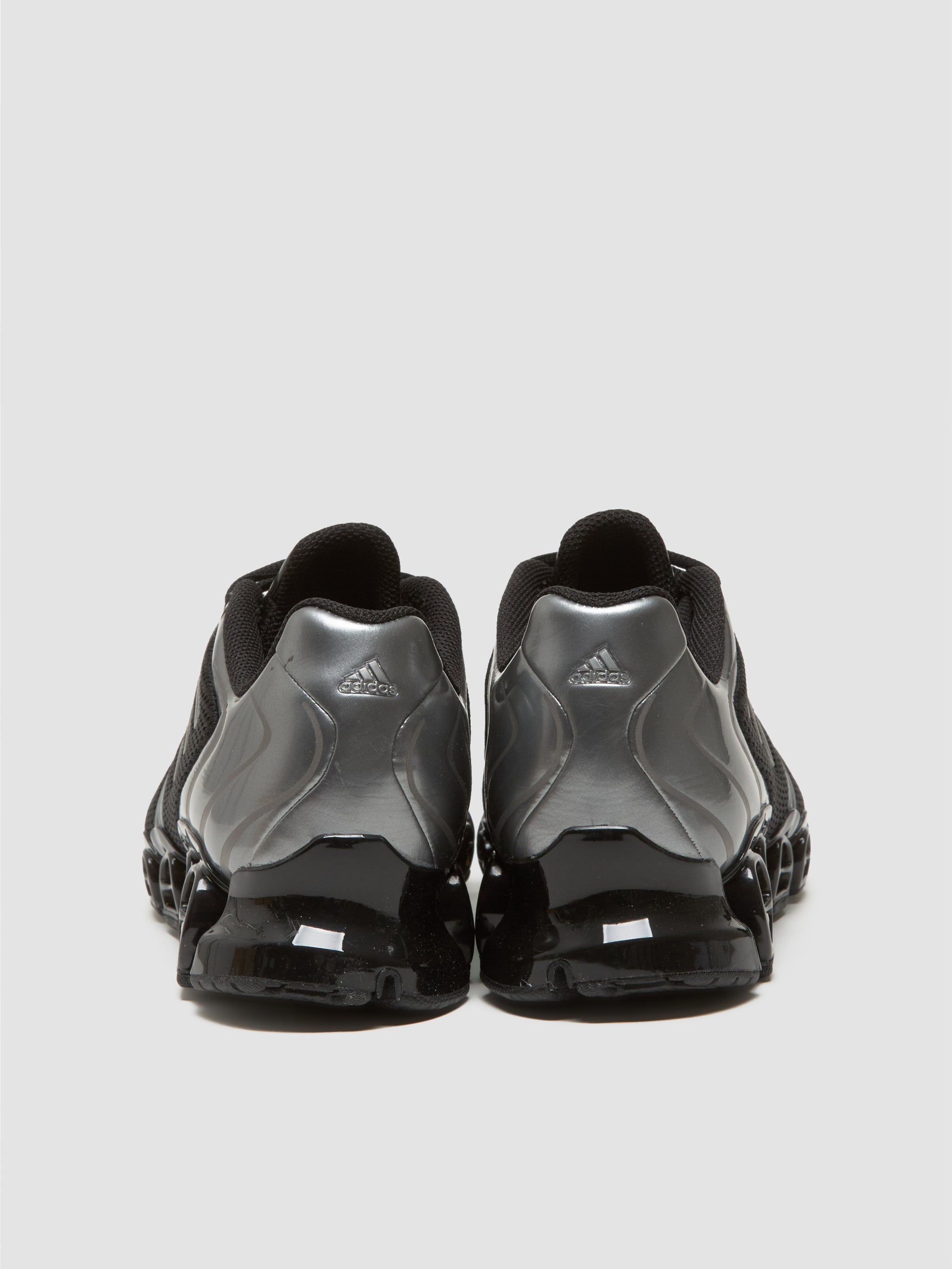 WMNS Mega Ghostride Sneaker in Black & Iron Metallic