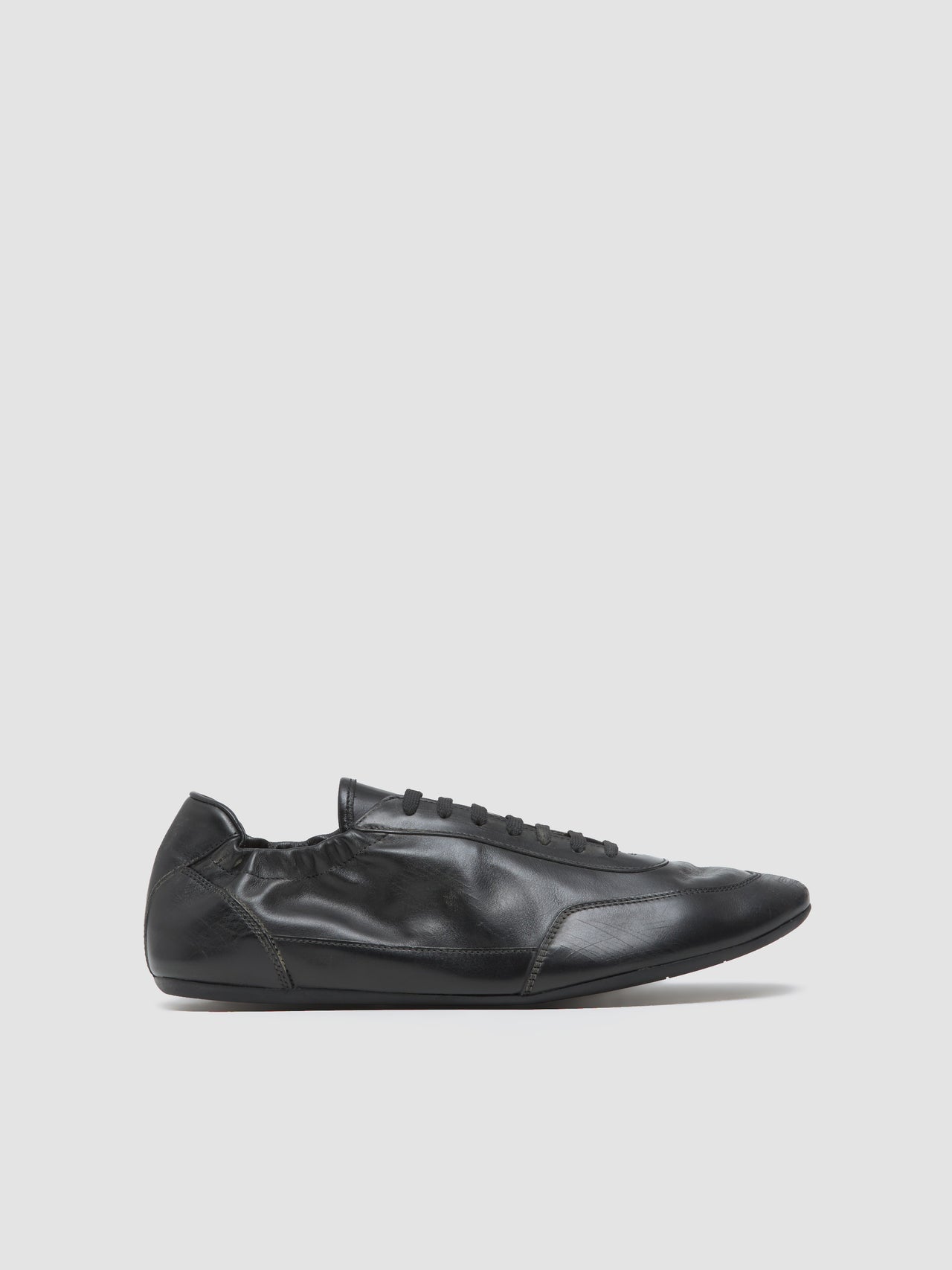 Leather Collapse Sneaker in Black