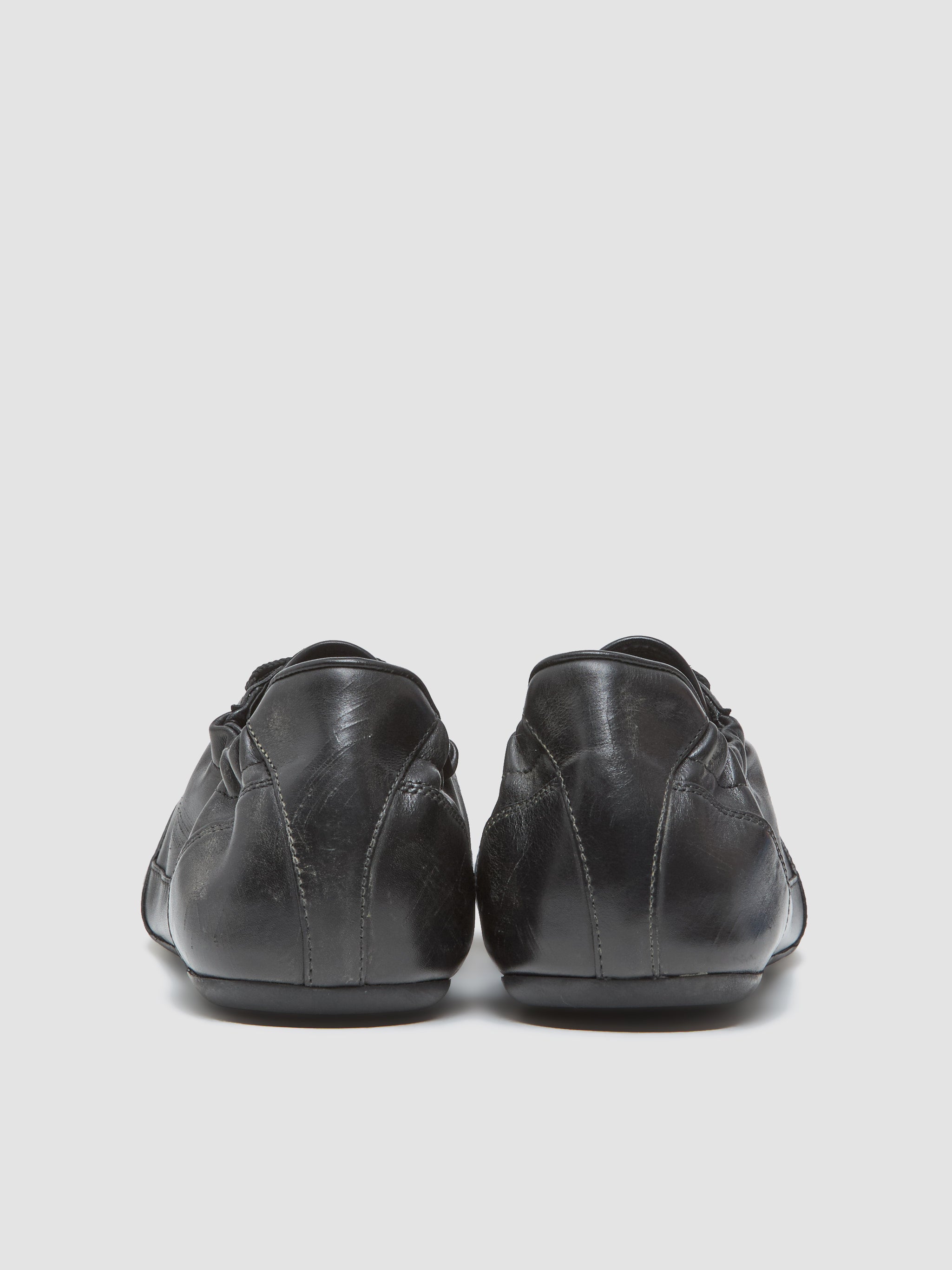 Leather Collapse Sneaker in Black