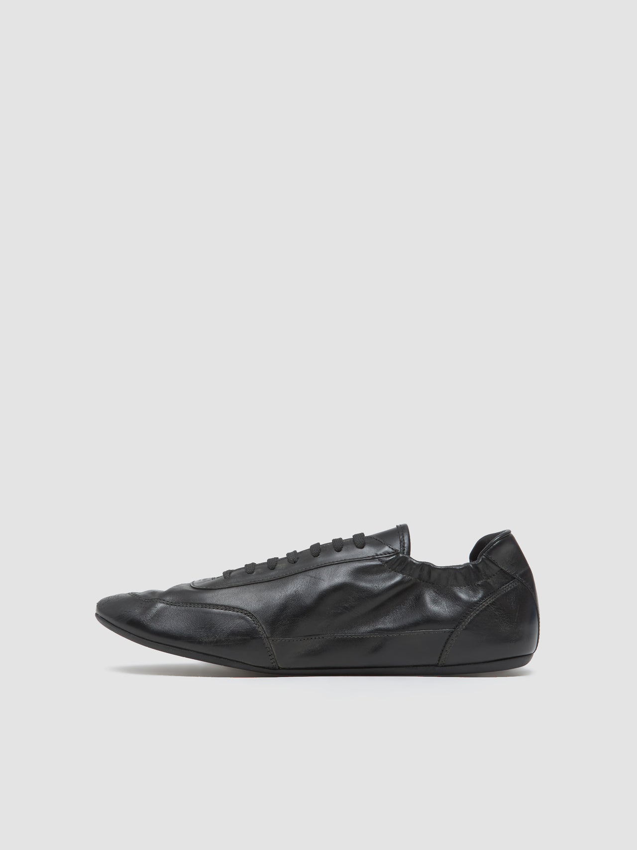 Leather Collapse Sneaker in Black