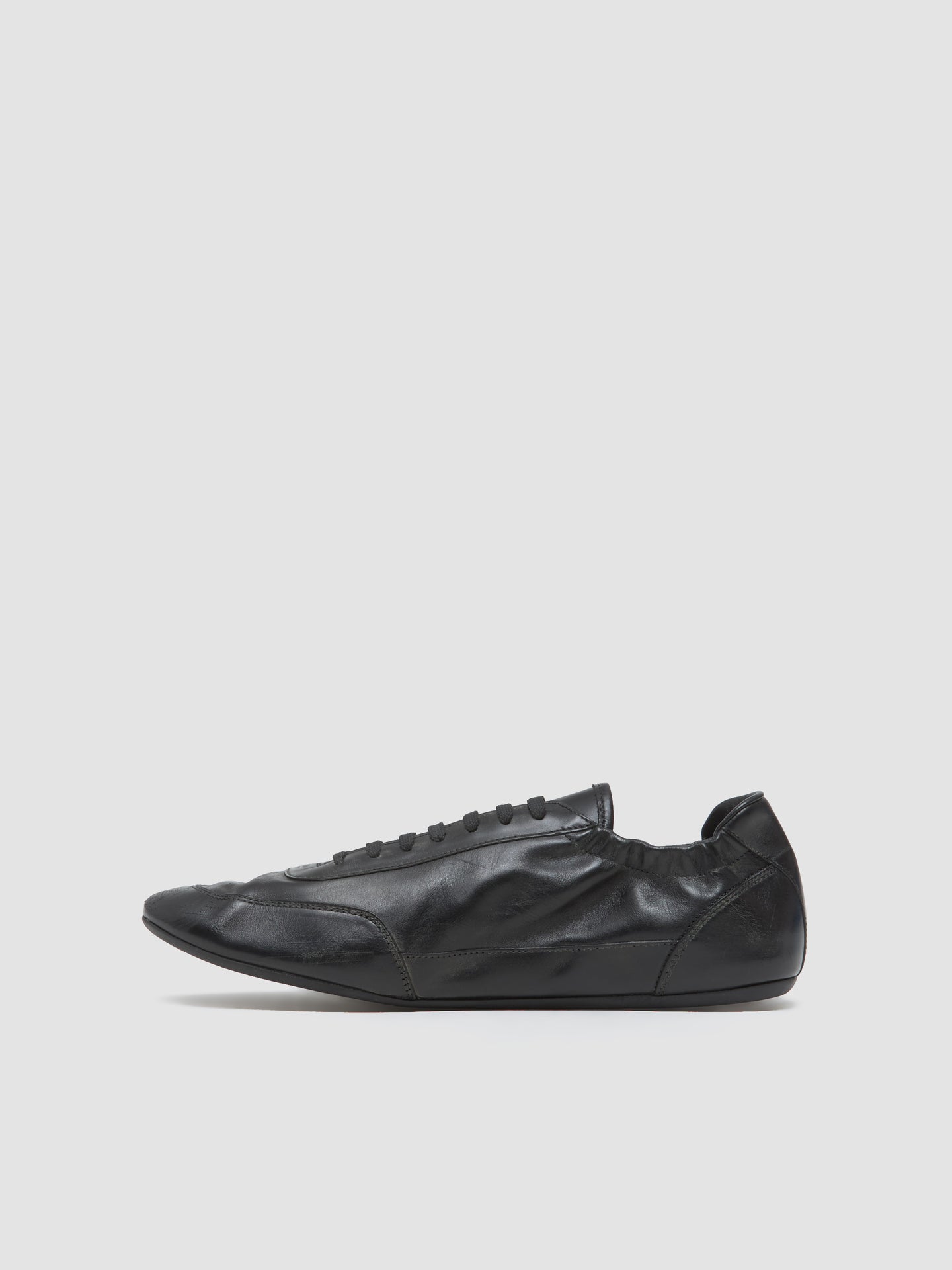 Leather Collapse Sneaker in Black