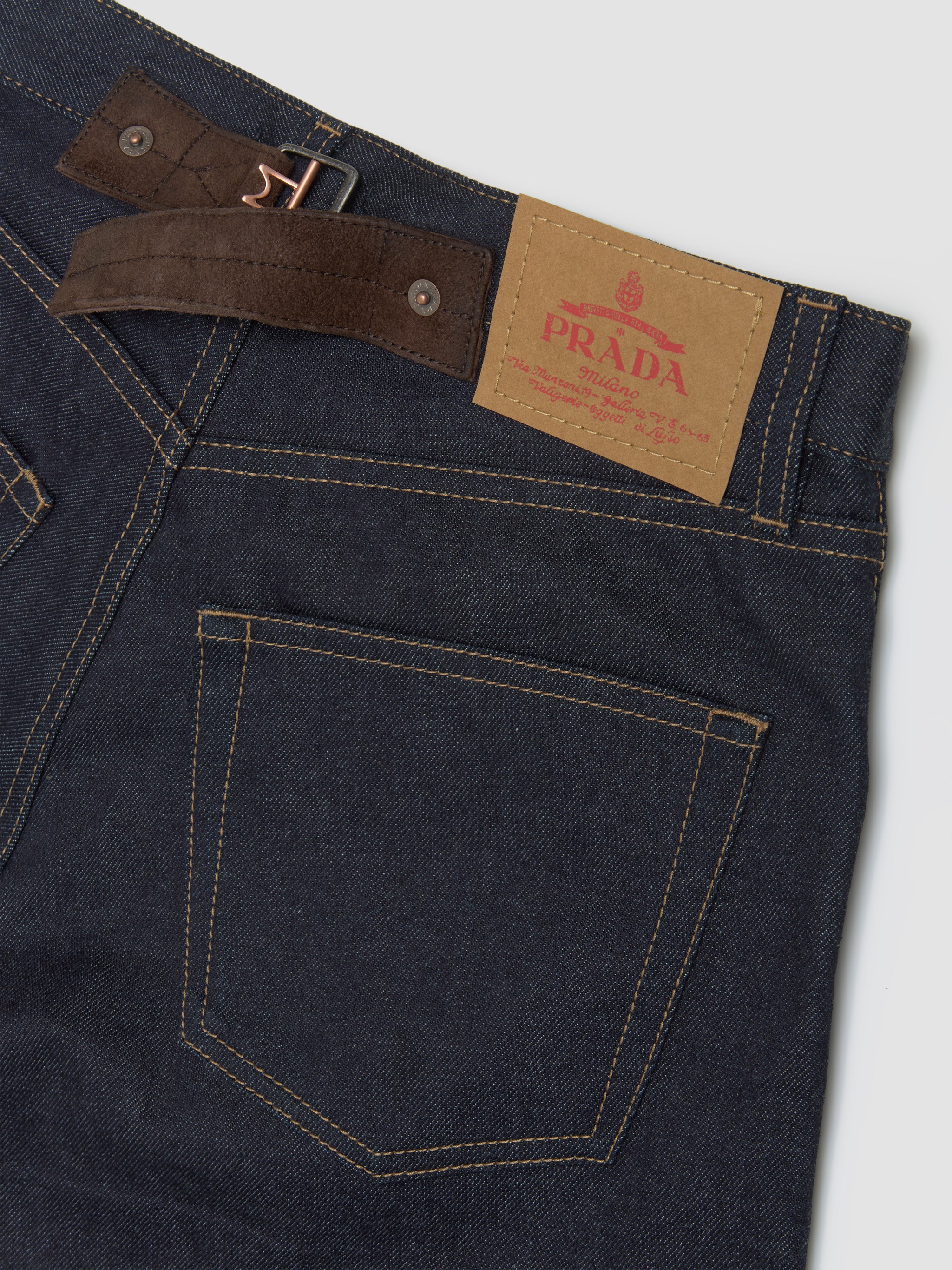 Raw Denim Jeans with Leather Strap in Blue