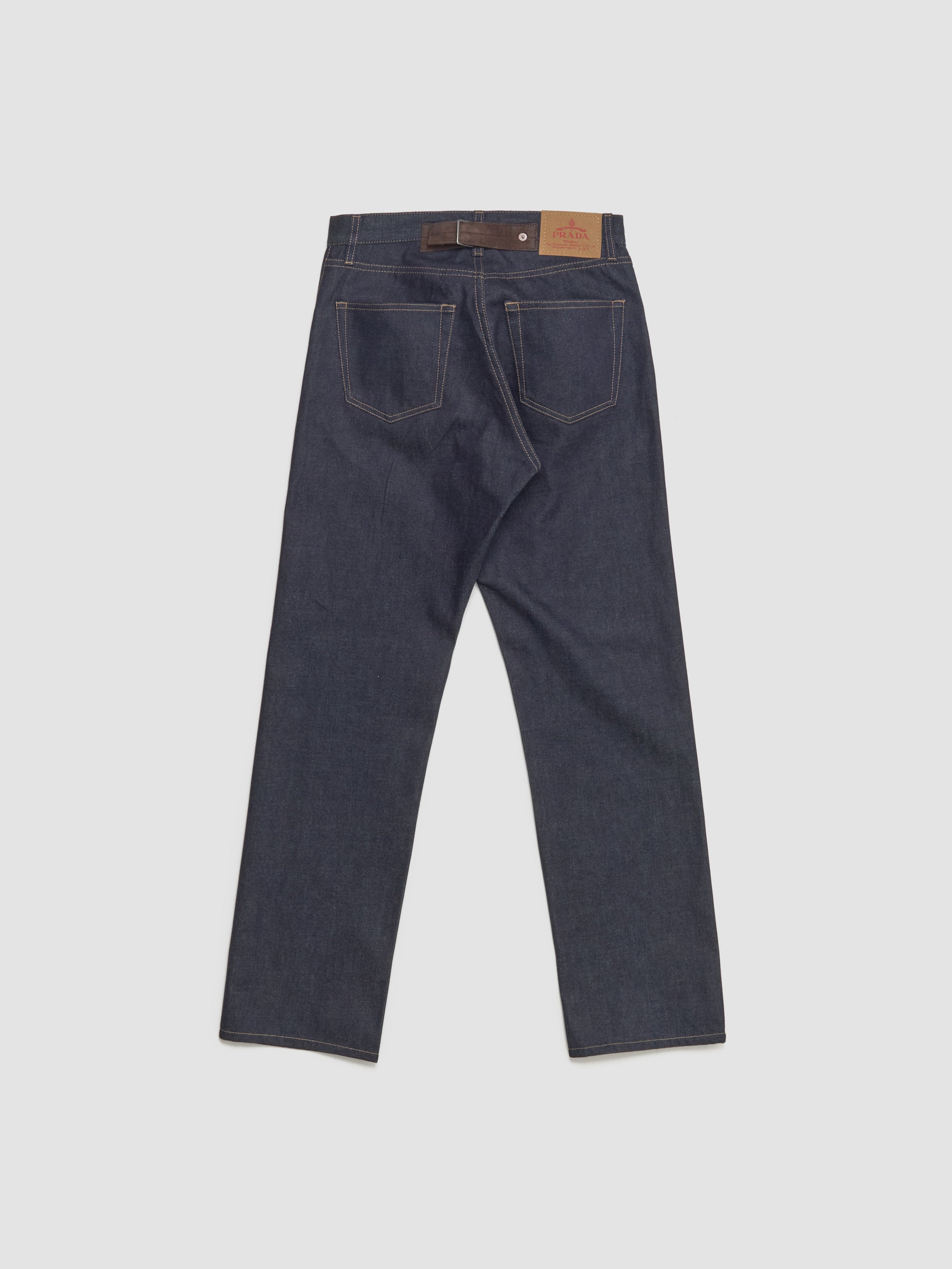 Raw Denim Jeans with Leather Strap in Blue