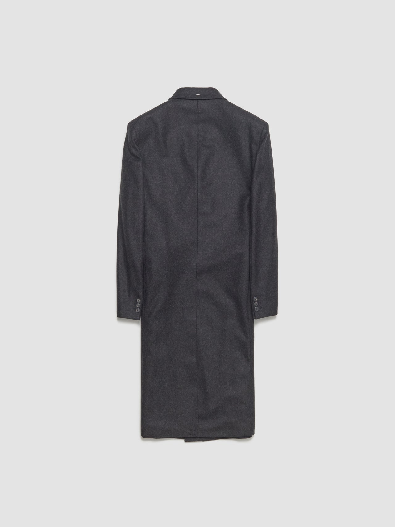 Dark grey coat on the light grey backgrouund