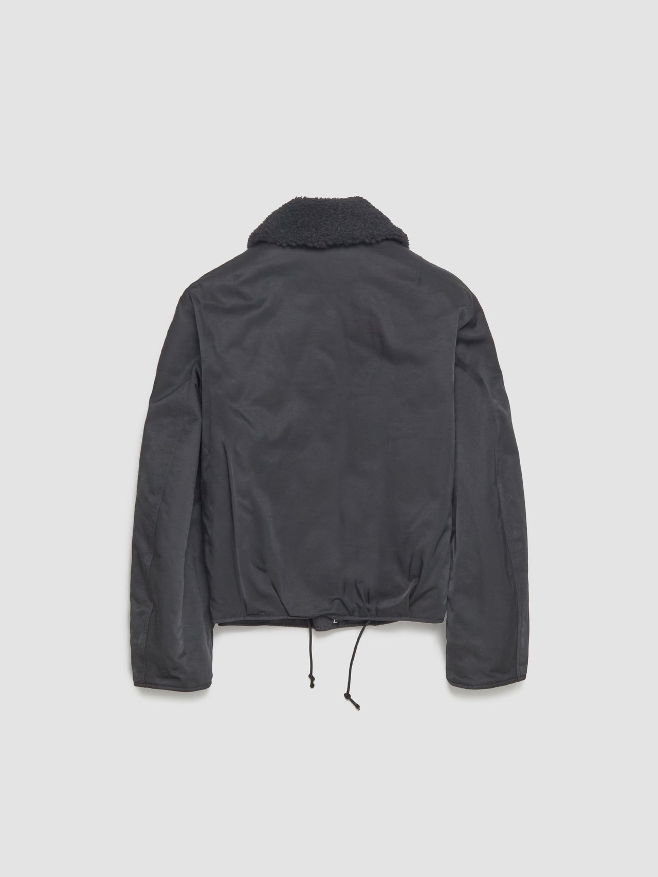 Black jacket on a light gray background