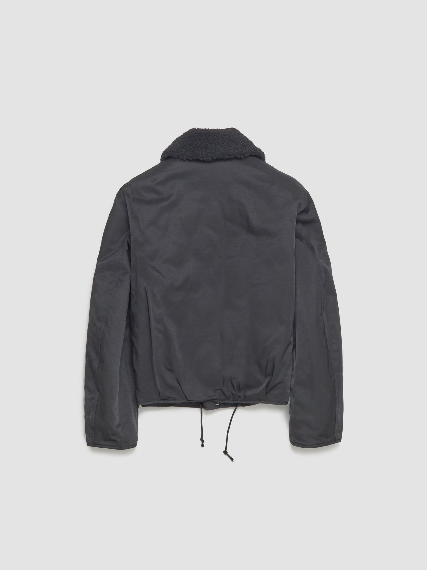 Black jacket on a light gray background