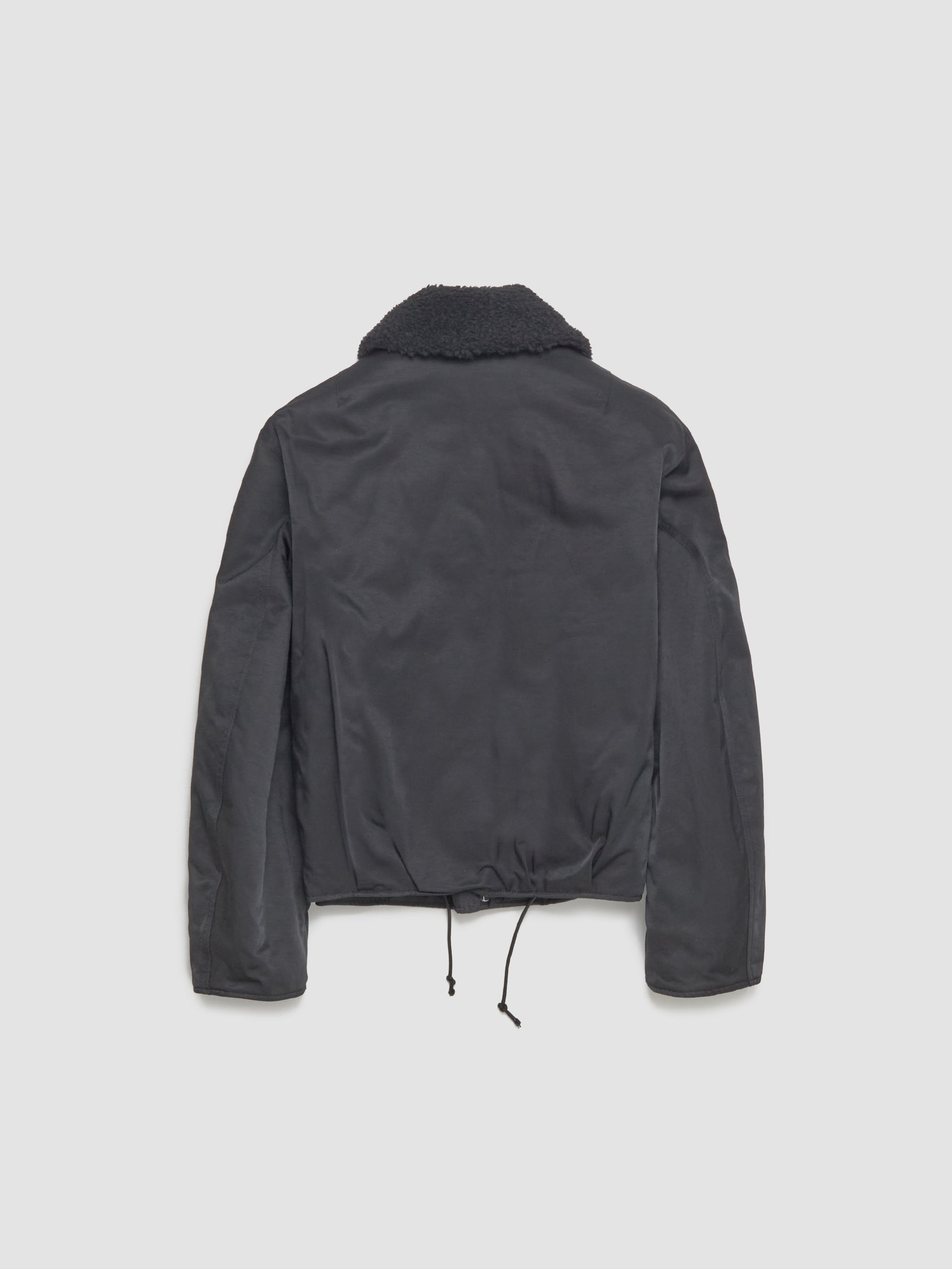 Black jacket on a light gray background