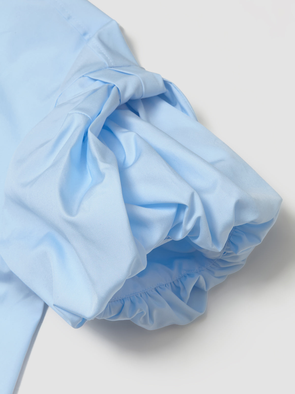 Cropped Puff Bow Sleeve Shirt in Baby Blue