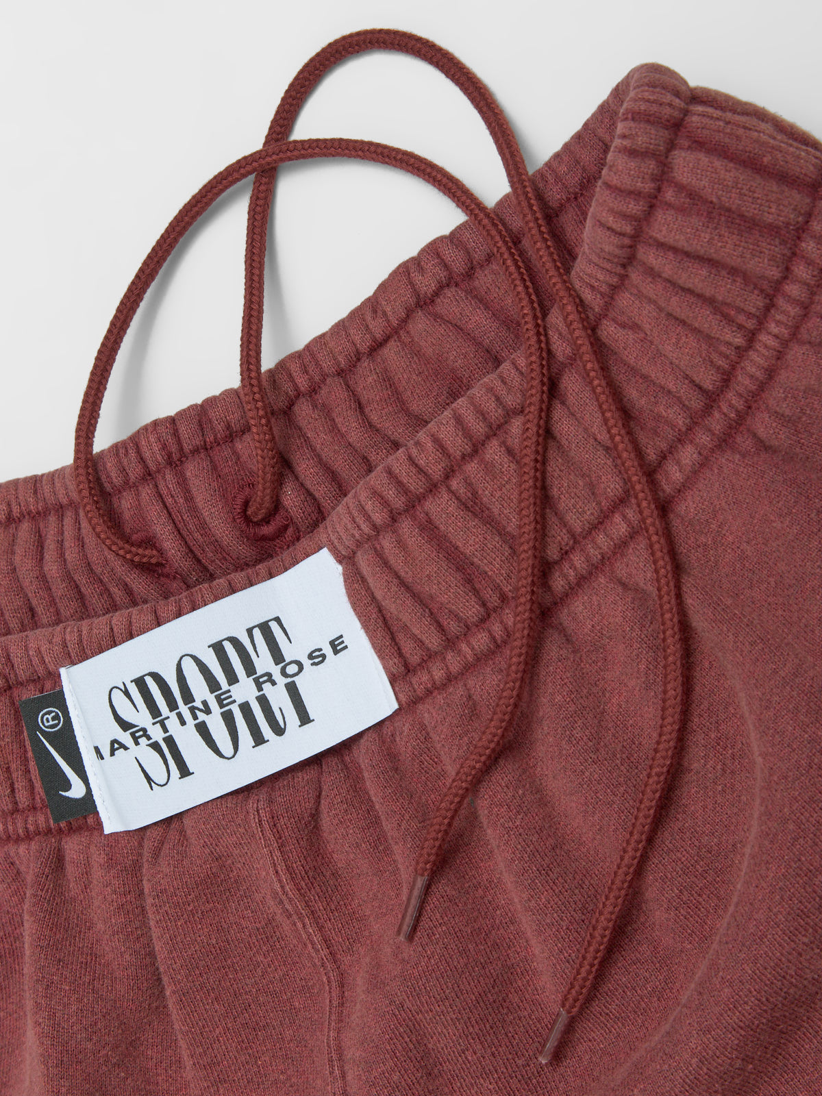 x Martine Rose Globus Fleece Pants in Team Crimson & Heather