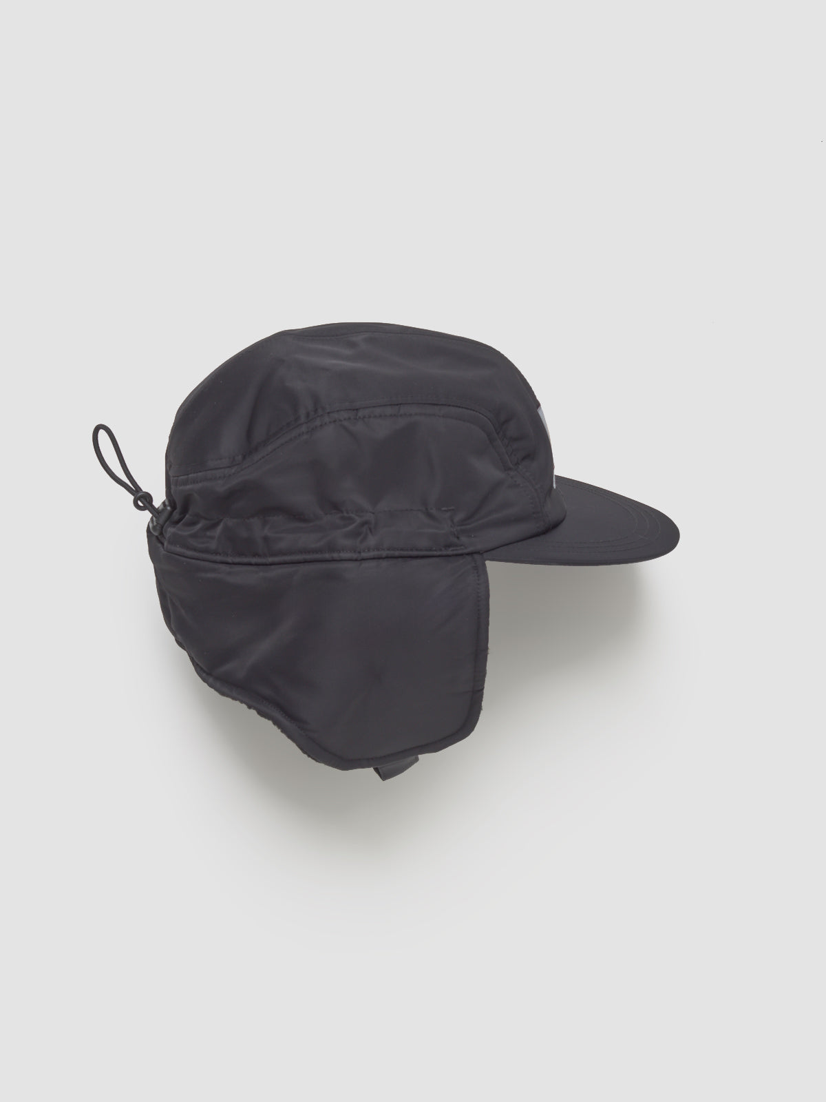 Oltera Ear Guard Cap in Black