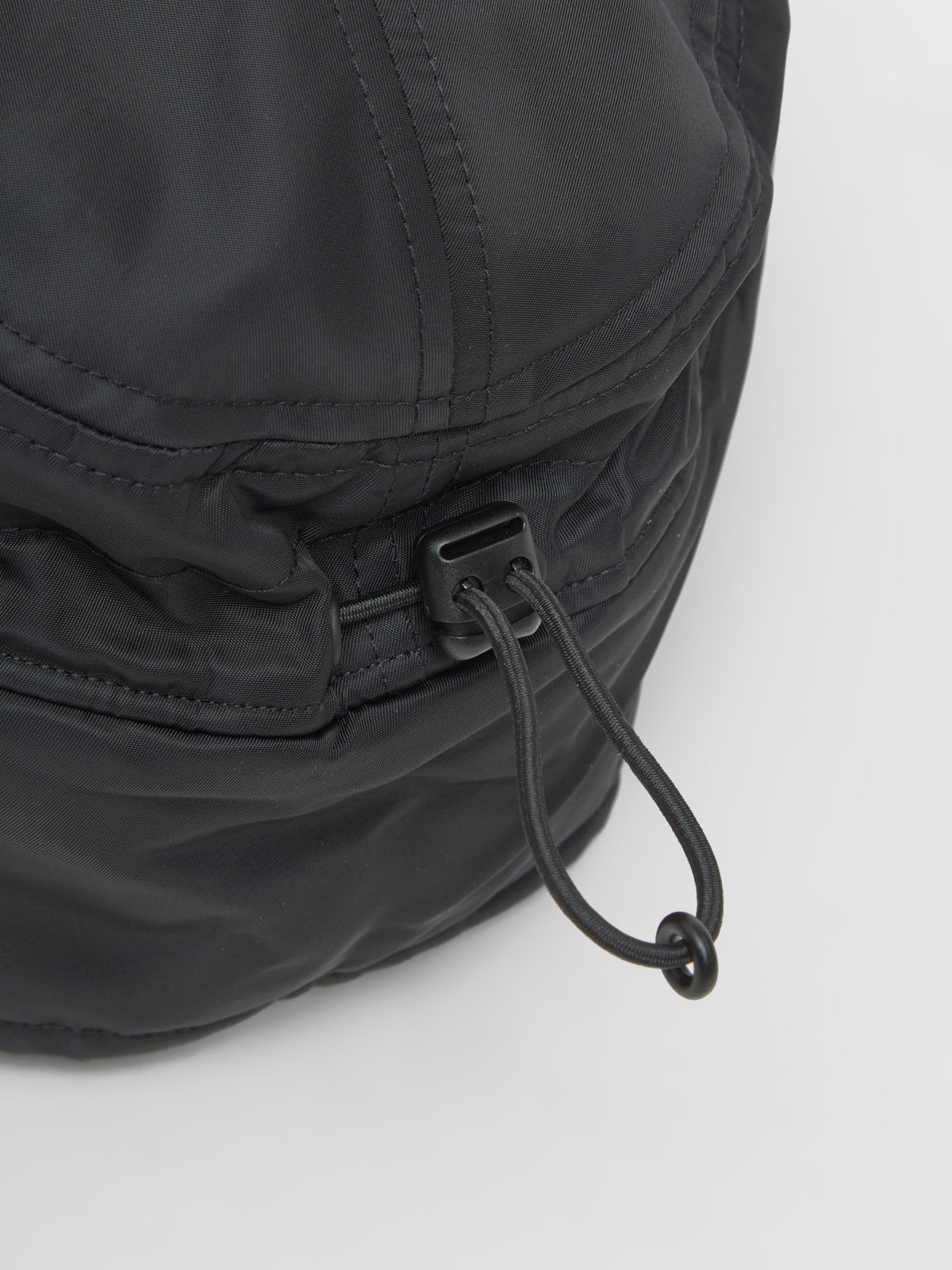 Oltera Ear Guard Cap in Black