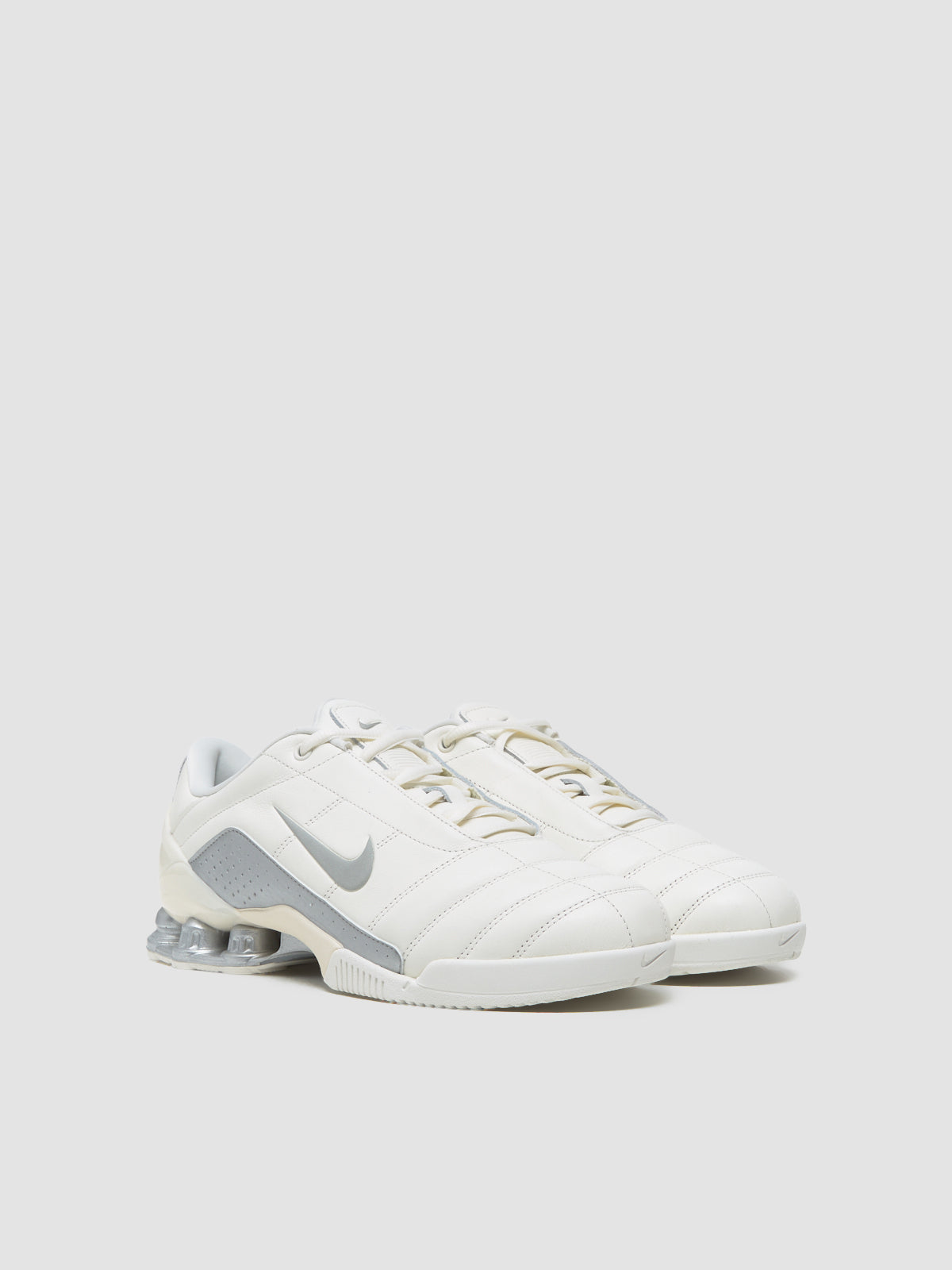 WMNS Total 90 Shox Magia Sneaker in Sail & Metallic Silver