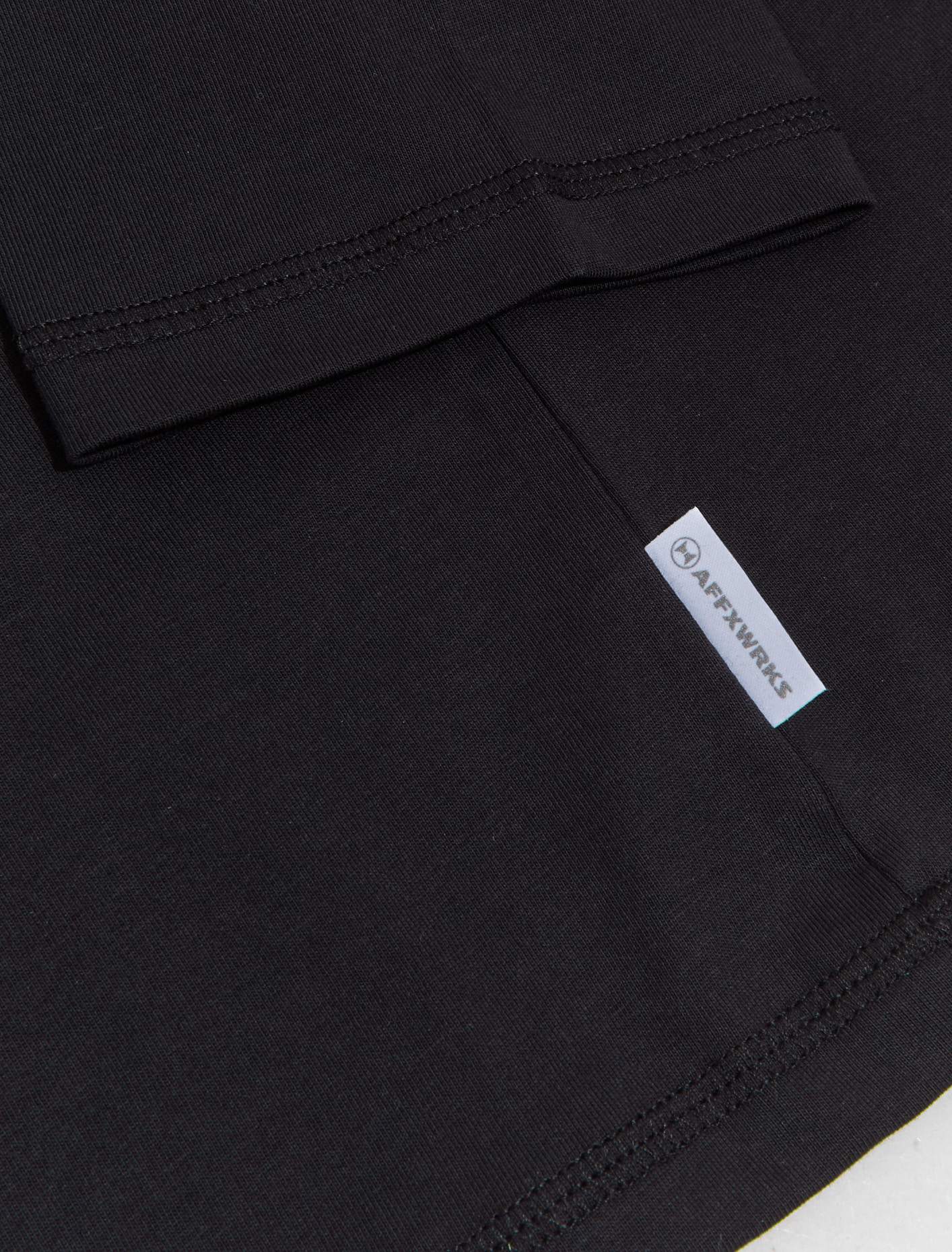 Standardised Pocket Long Sleeve T-Shirt in Black