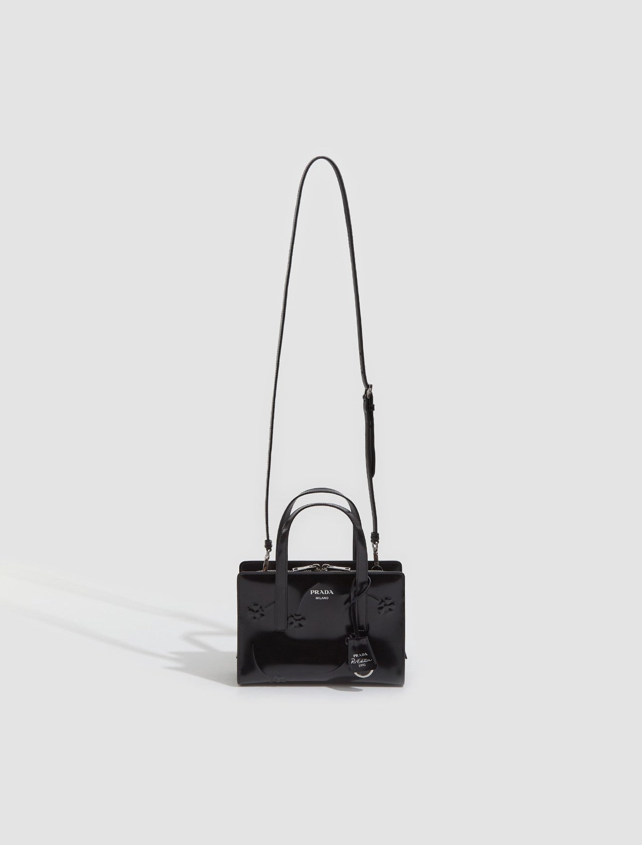 Re-Edition 1995 Brushed Leather Mini Handbag in Black